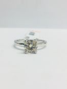 Platinum Diamond Solitaire Ring With A. Diamond Set Under Setting,