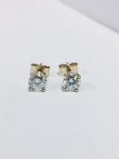 1.00Ct Diamond Solitaire Earrings Set In 18Ct Yellow Gold.