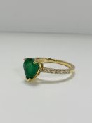 14ct Yellow Gold Emerald and Diamond ring featuring centre, pear cut, medium green Emerald (1.23ct),