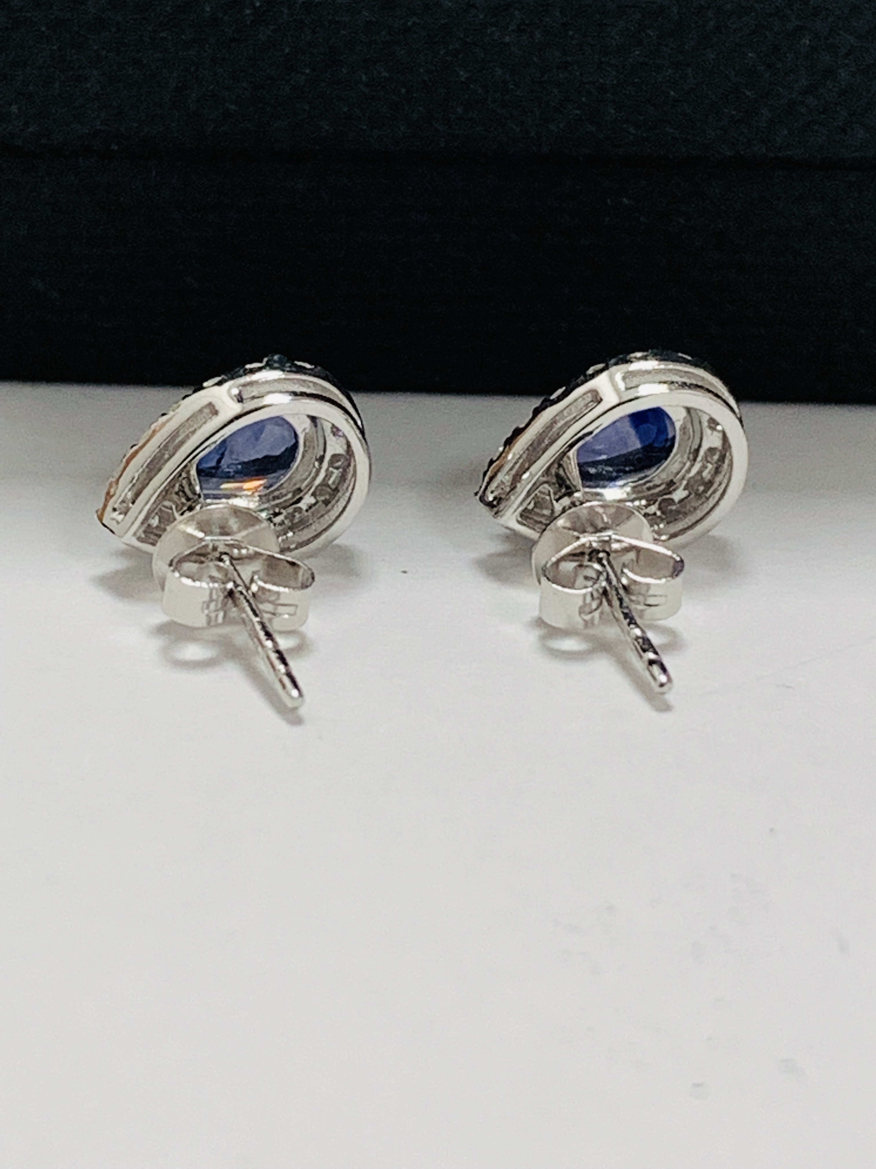 14ct White Gold Sapphire and Diamond earrings featuring centre, 2 pear cut, medium blue Sapphire (1. - Image 6 of 12