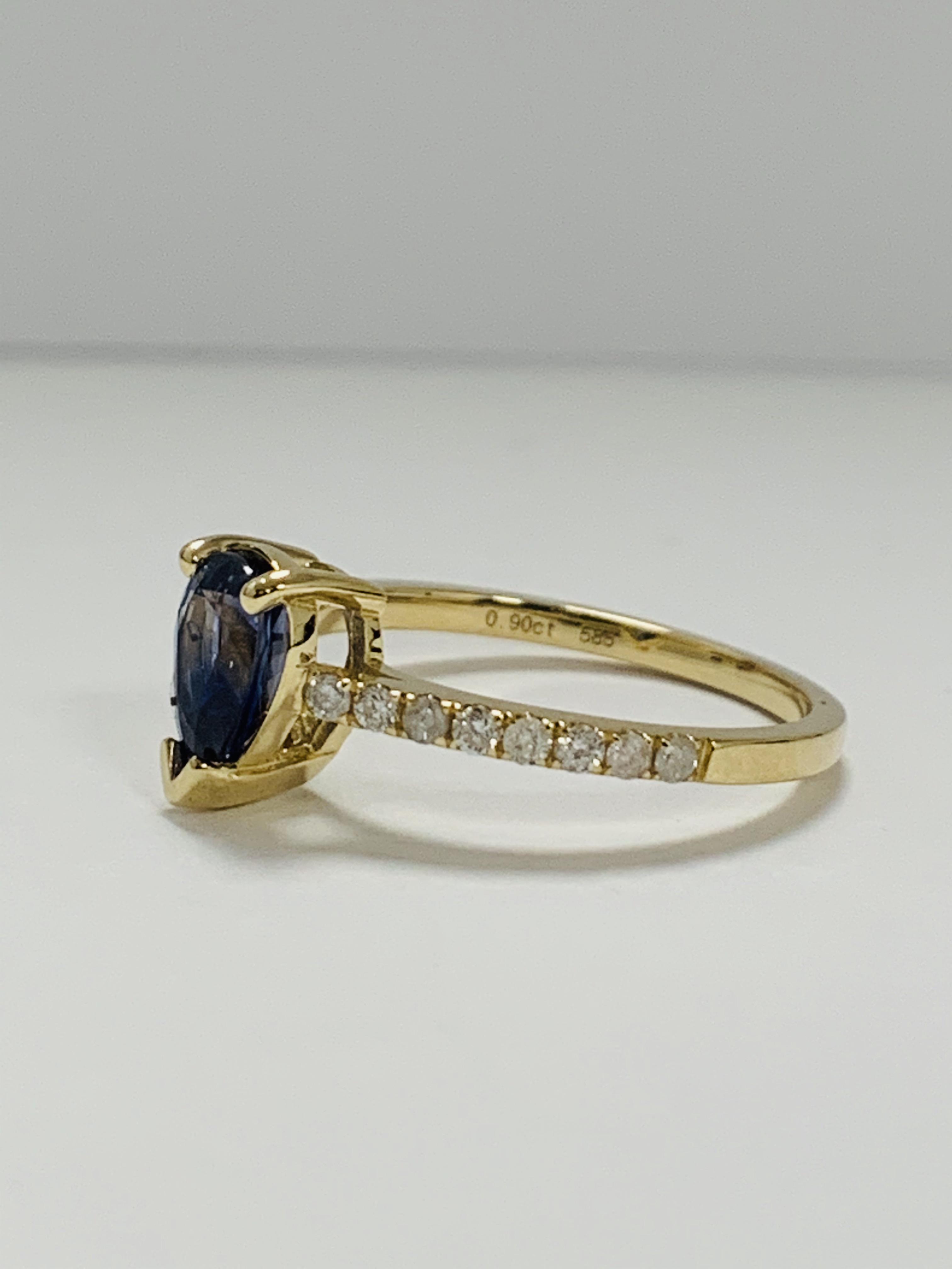 14ct Yellow Gold Sapphire and Diamond ring featuring centre, pear cut, medium blue Sapphire (0.90ct) - Image 2 of 13