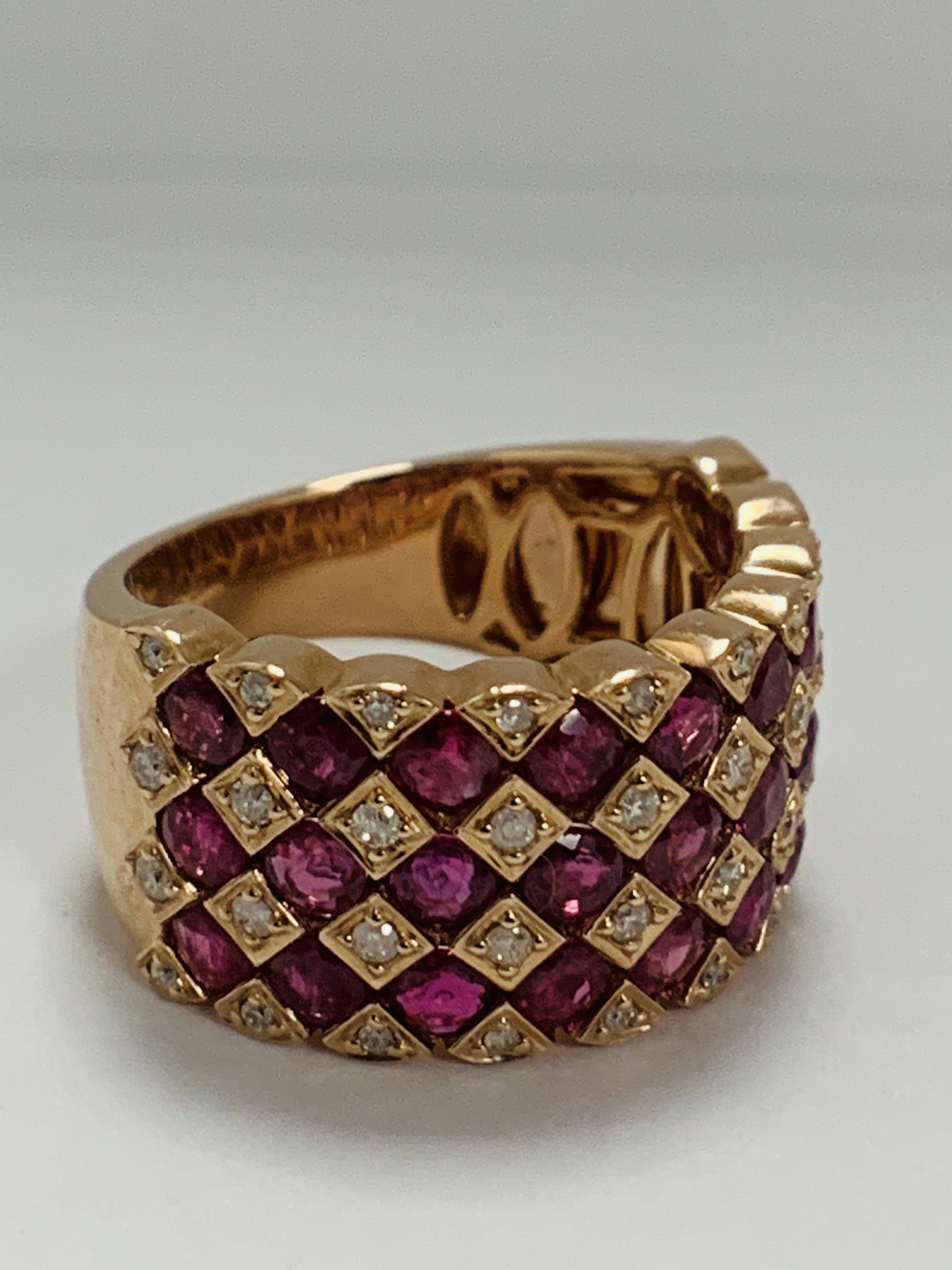 14ct Rose Gold Ruby and Diamond ring featuring, 27 round cut, medium pinkish red (2.81ct TSW), chann - Image 7 of 13