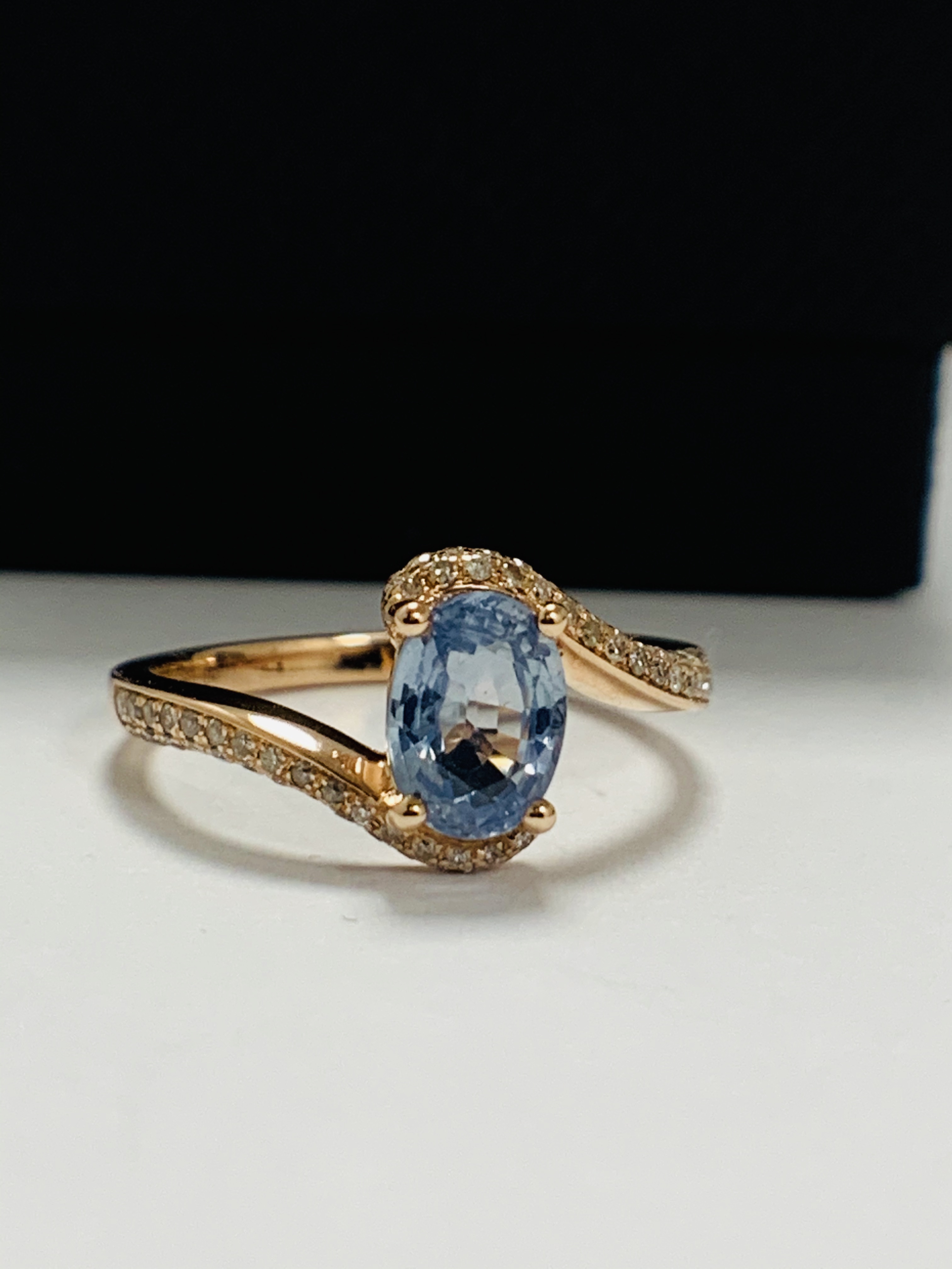 14ct Rose Gold Sapphire and Diamond ring featuring centre, oval cut, blue Sapphire (1.10ct), claw se - Image 9 of 13