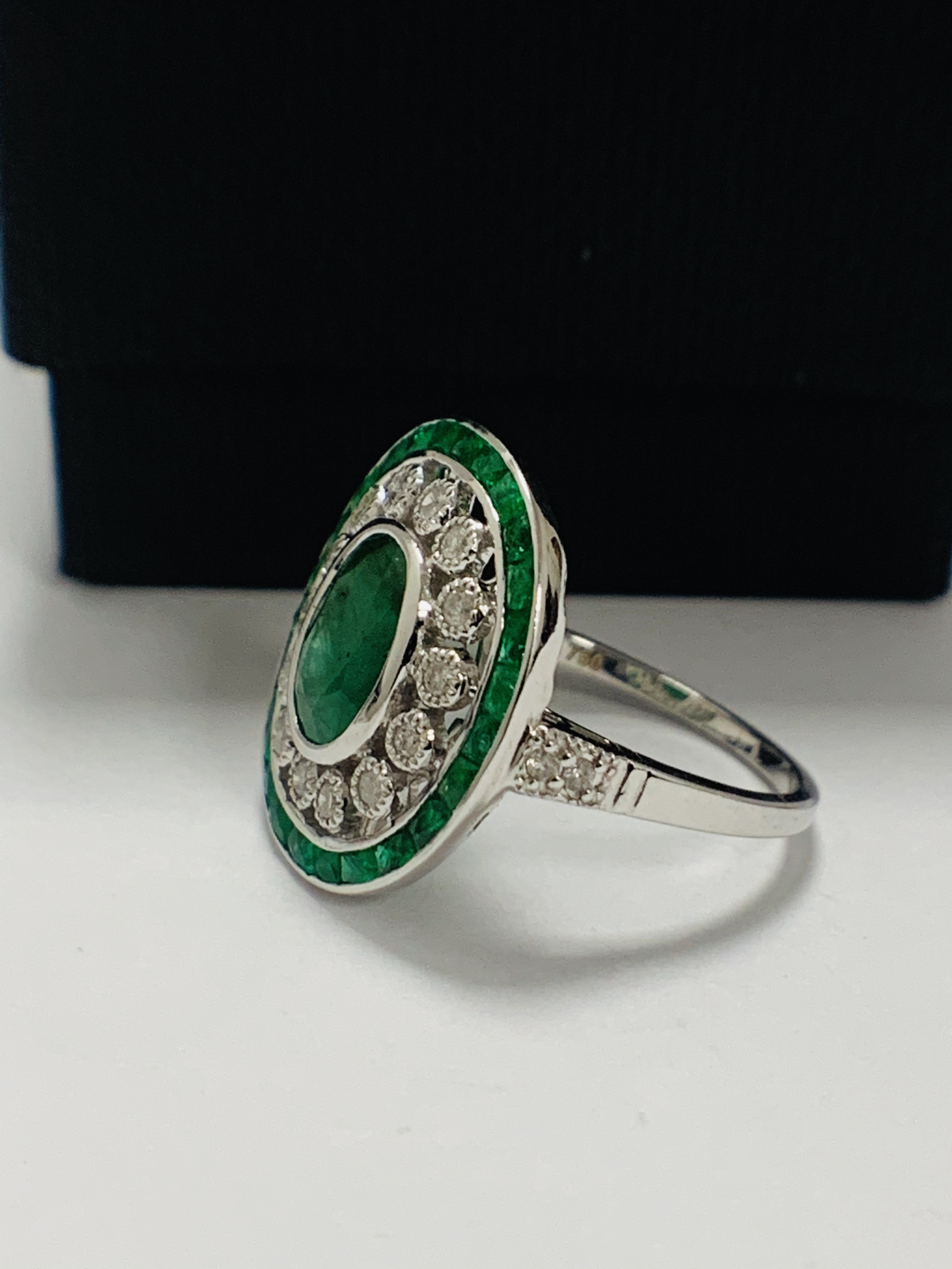 18ct White Gold Emerald and Diamond ring featuring centre, oval cut, green Emerald (2.06ct), claw se - Image 2 of 11