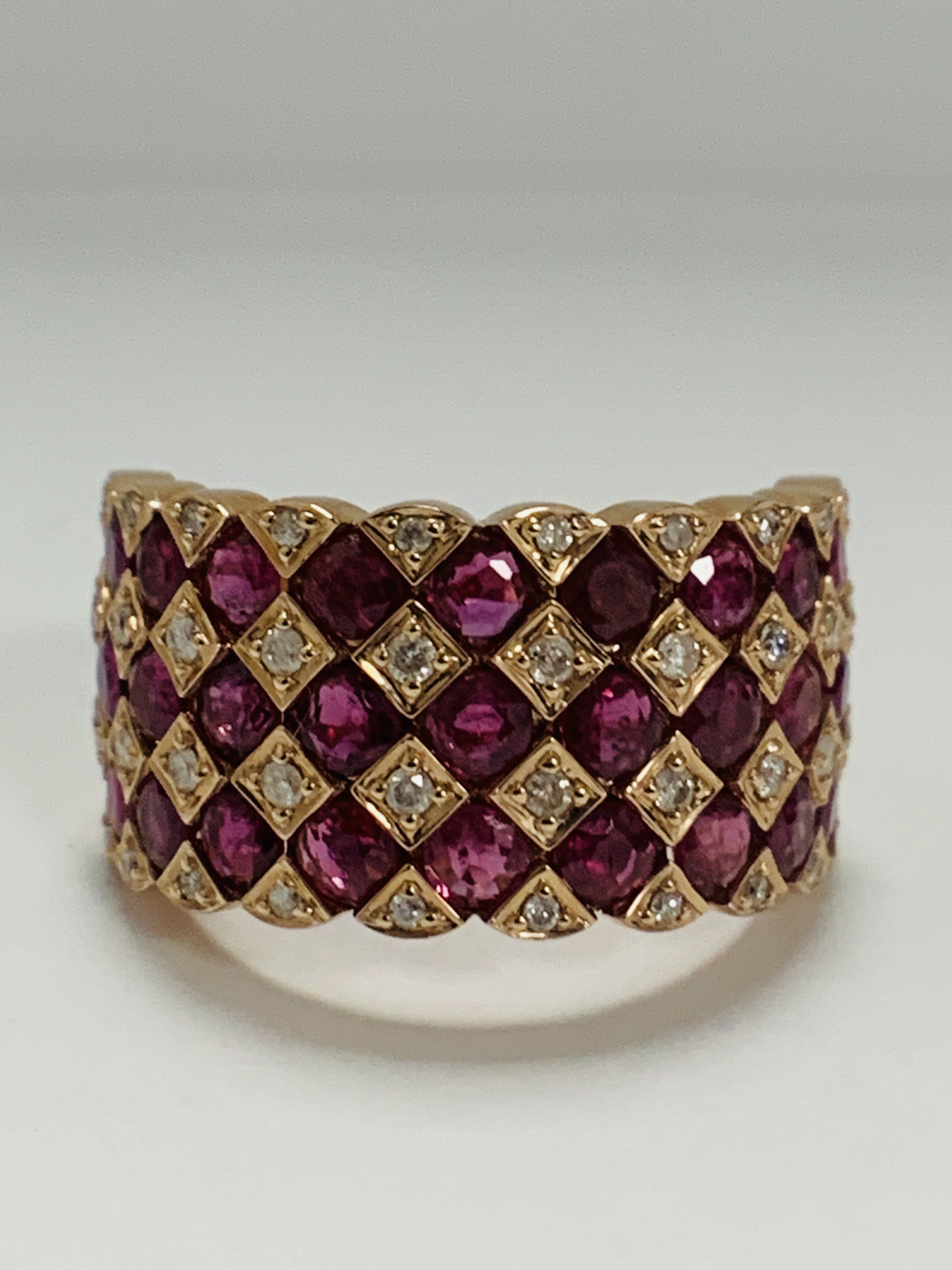 14ct Rose Gold Ruby and Diamond ring featuring, 27 round cut, medium pinkish red (2.81ct TSW), chann - Image 8 of 13