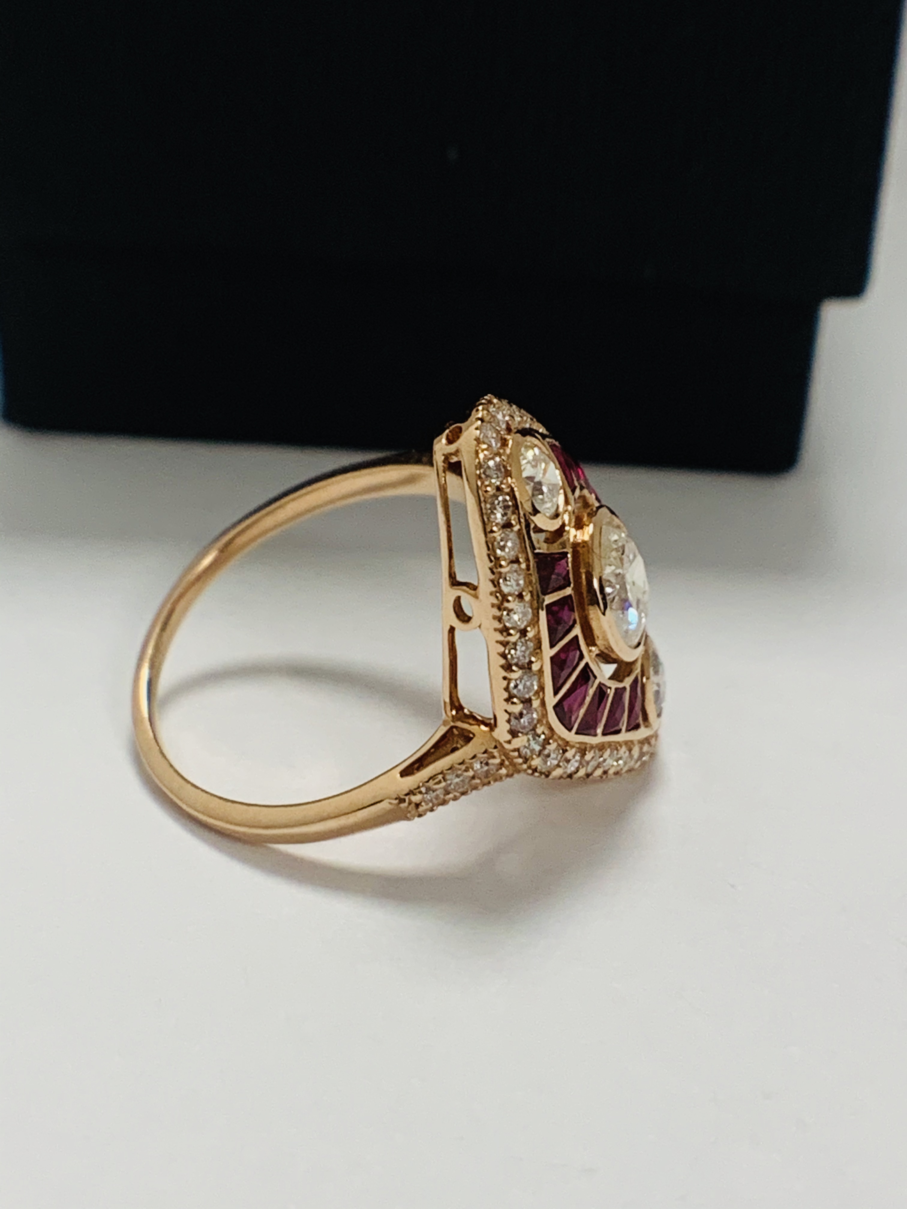 14ct Rose Gold Ruby and Diamond ring featuring centre, round brilliant cut Diamond (0.51ct), bezel s - Image 6 of 10