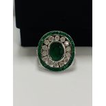 18ct White Gold Emerald and Diamond ring featuring centre, oval cut, green Emerald (2.06ct), claw se