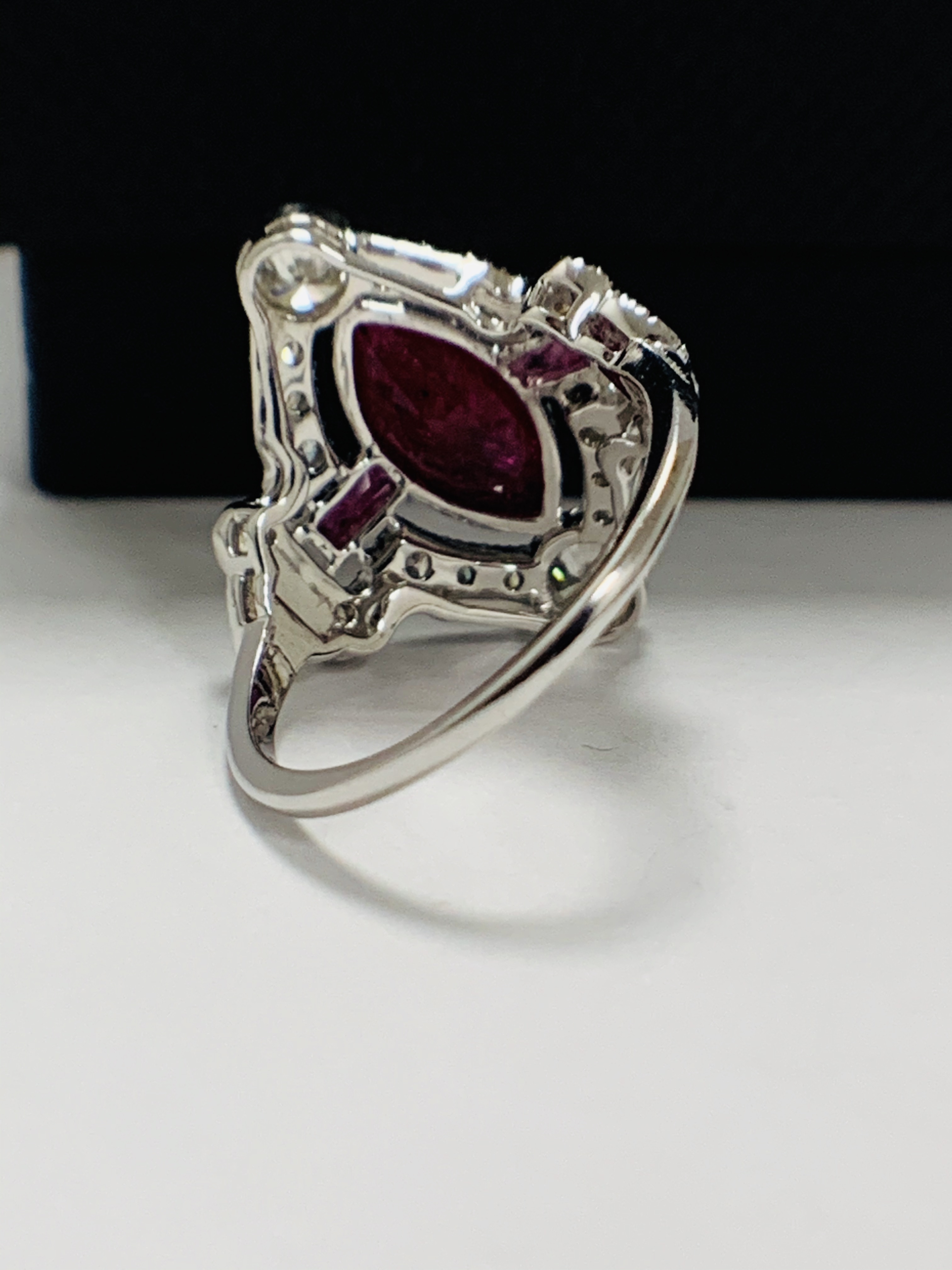 18ct White Gold Ruby and Diamond ring featuring centre, marquise cut, Natural Ruby (1.34ct), claaw s - Image 5 of 13