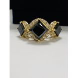 14ct Yellow Gold black Diamond trilogy ring featuring centre, 3 princess cut, black Diamonds (5.03ct