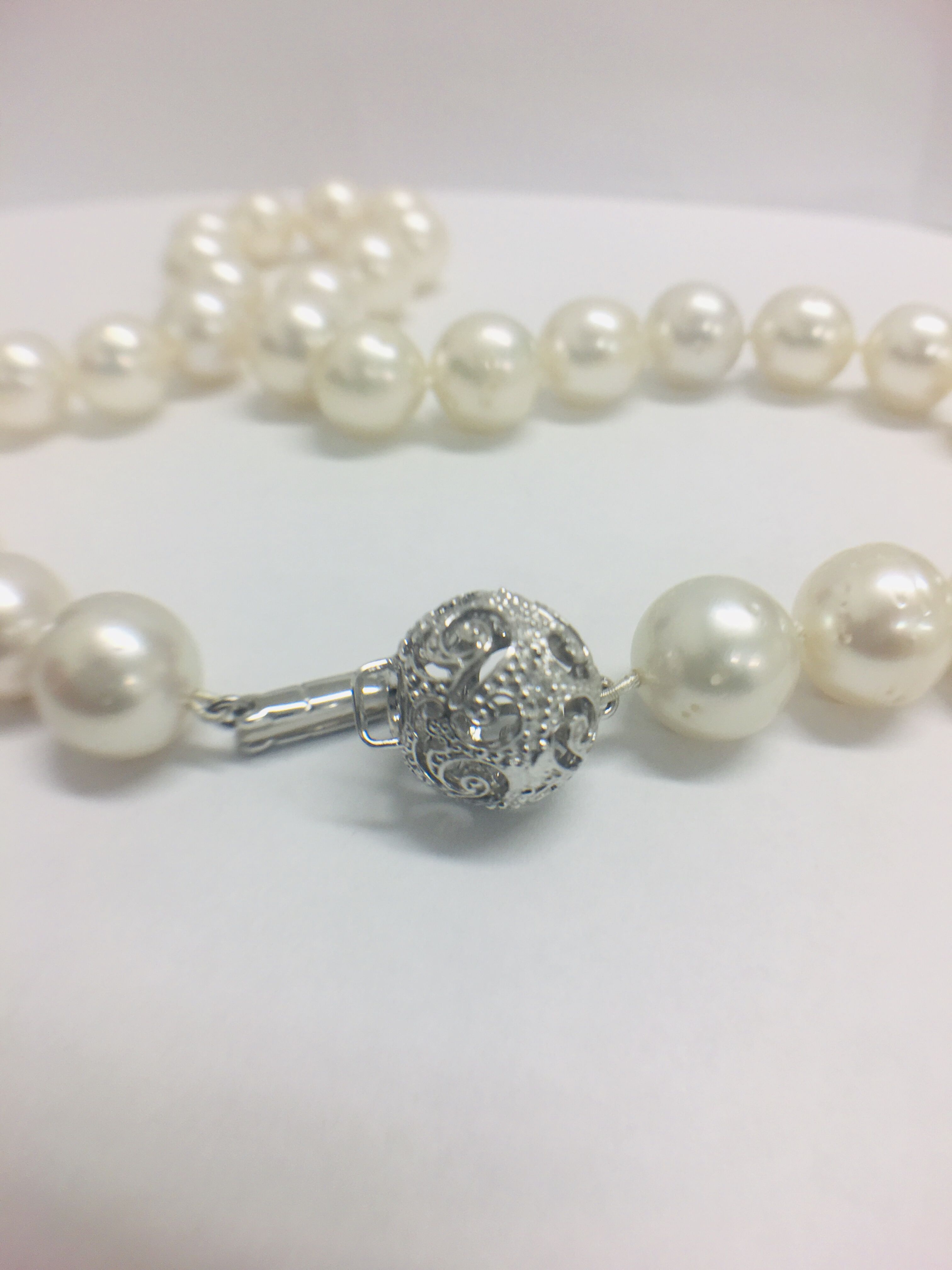 strand 35 south sea pearls with 14ct white gold filagree style ball