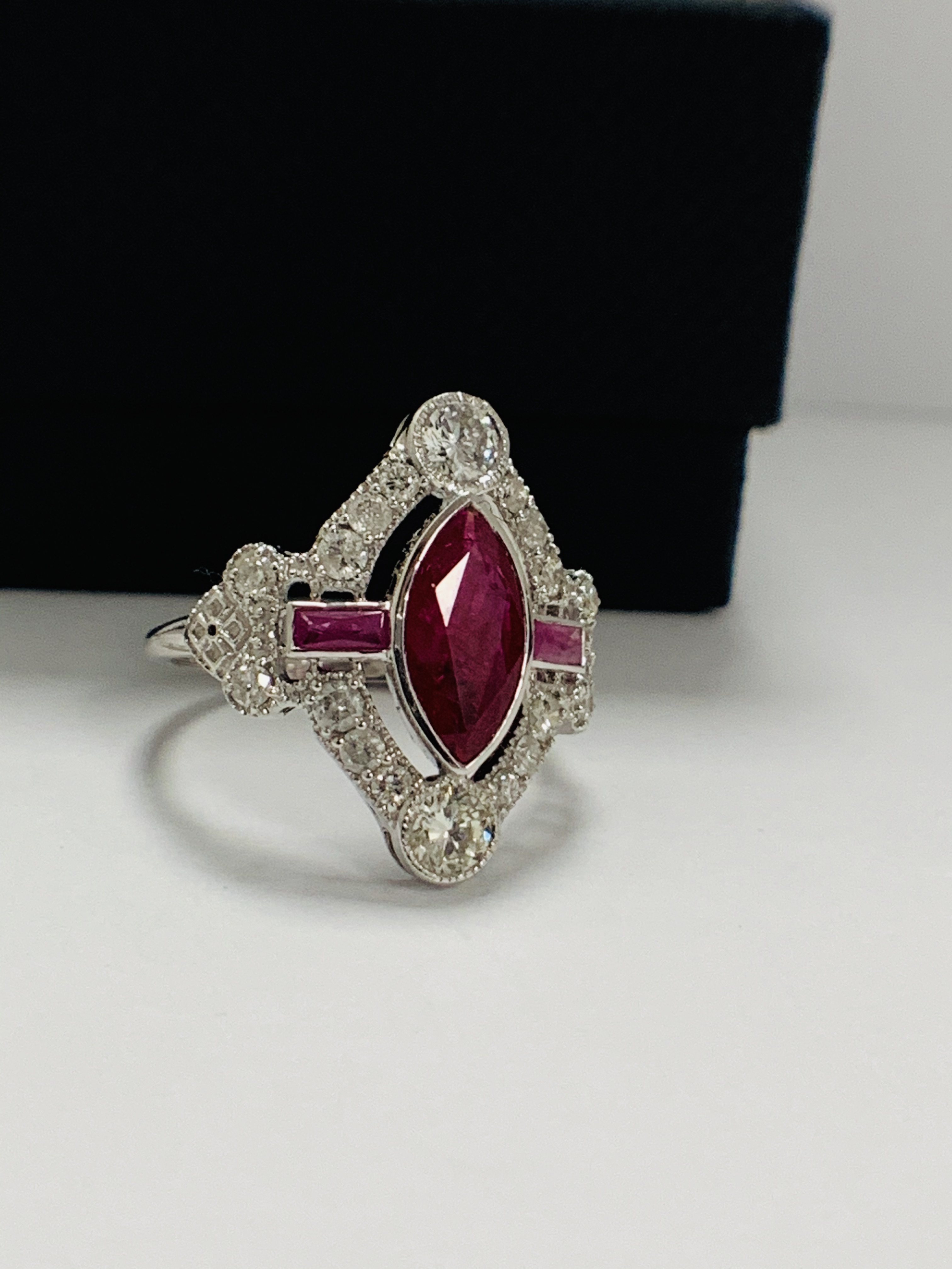 18ct White Gold Ruby and Diamond ring featuring centre, marquise cut, Natural Ruby (1.34ct), claaw s - Image 10 of 13