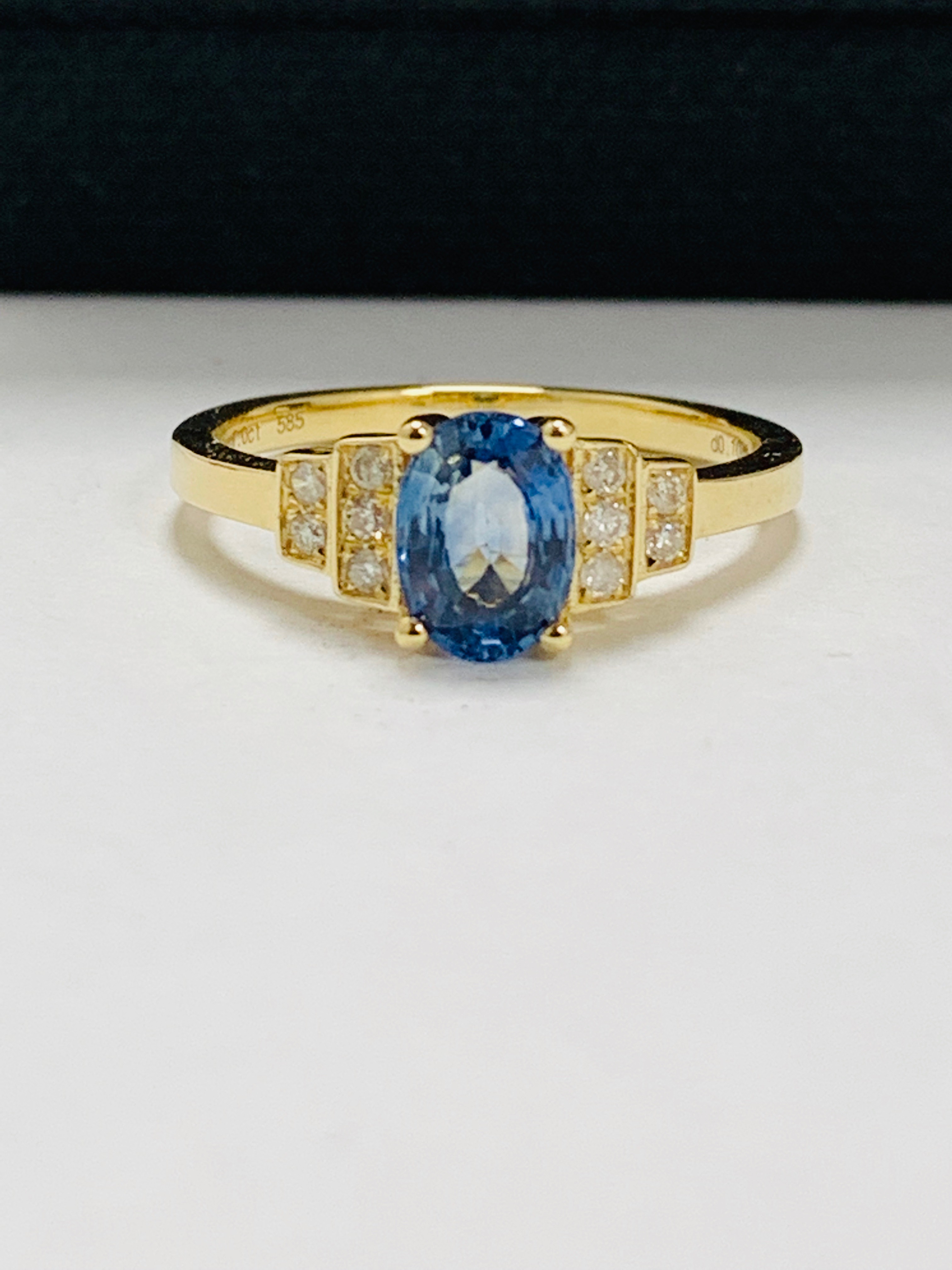 14ct yellow gold sapphire and diamond ring.