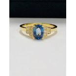 14ct yellow gold sapphire and diamond ring.