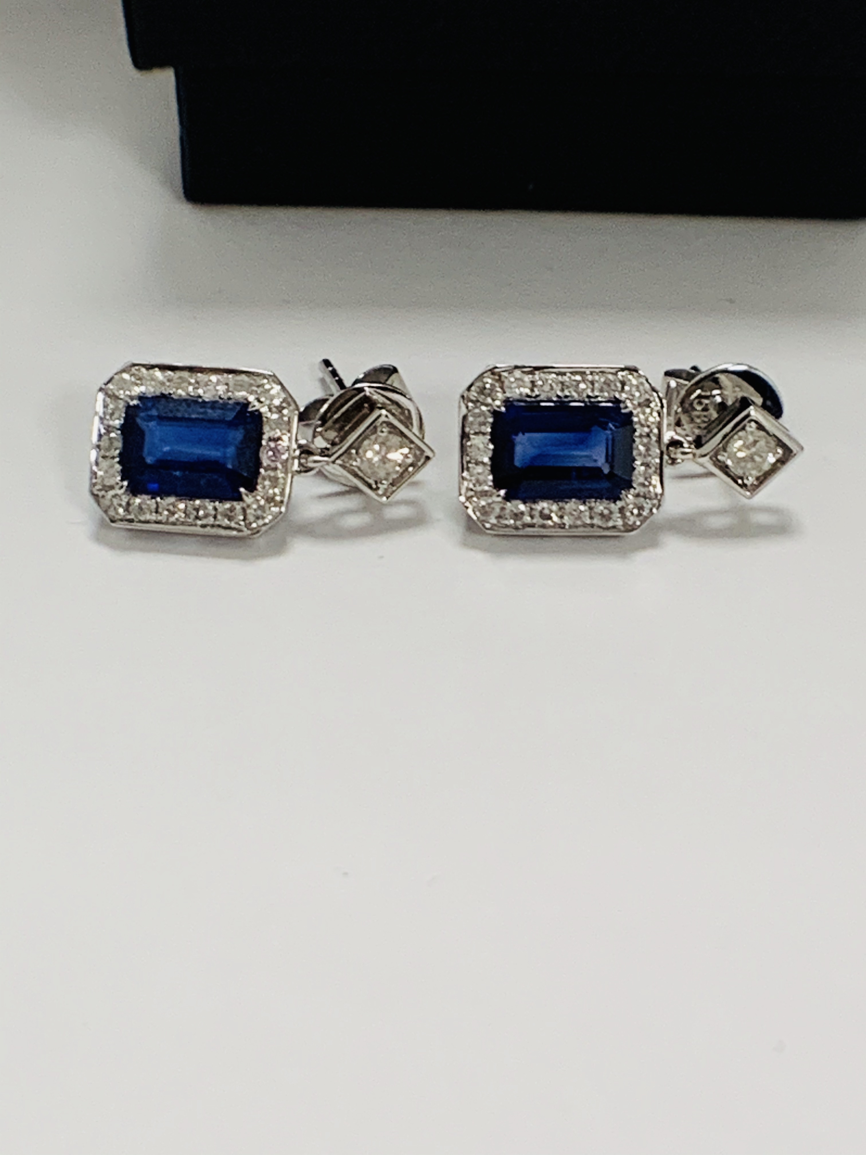 14ct White Gold Sapphire and Diamond drop earrings featuring, emerald cut, vivid blue Sapphires (2.1 - Image 2 of 15