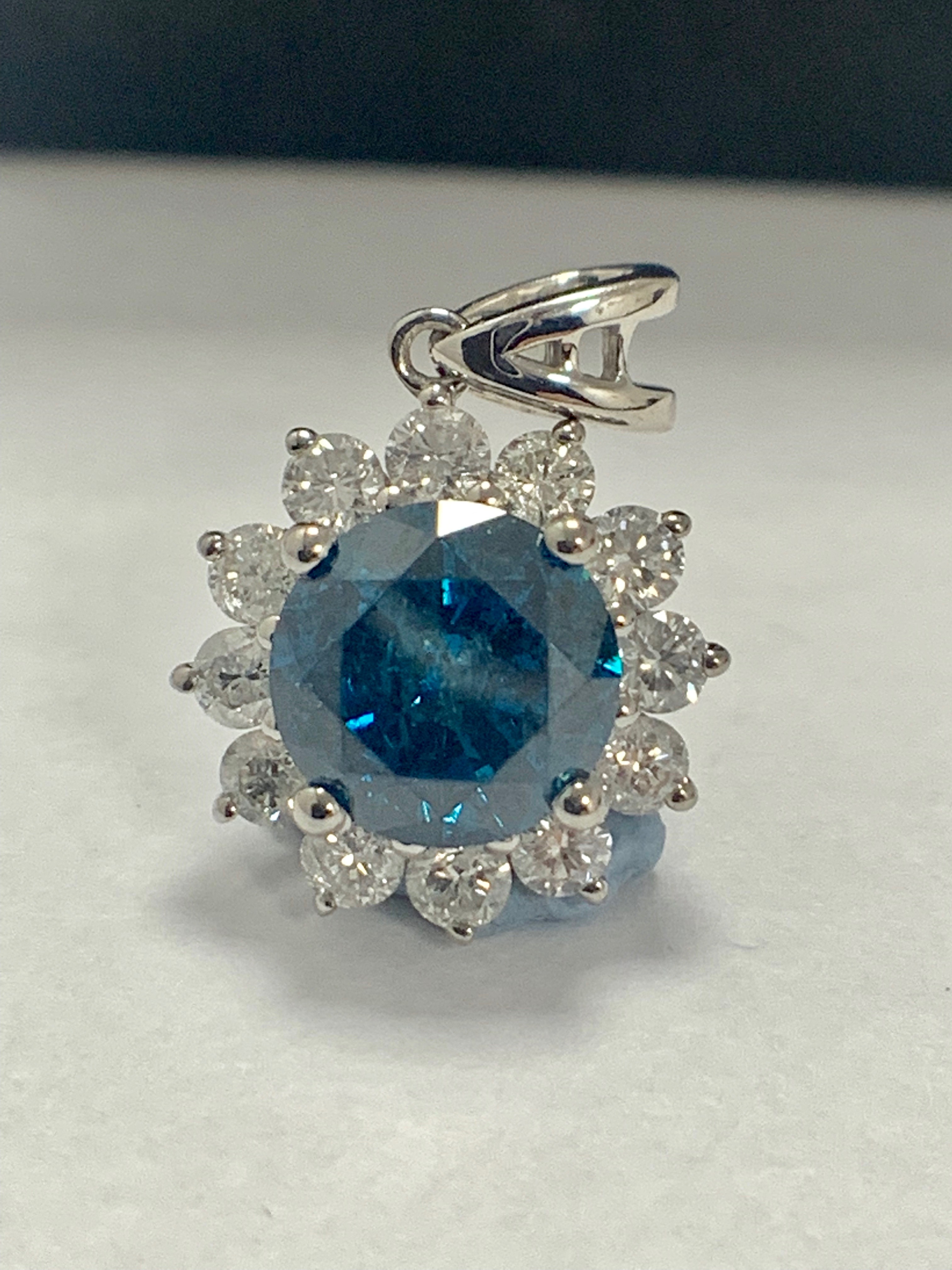 14ct White Gold Diamond pendant featuring centre, round brilliant cut, blue Diamond (1.70ct)
