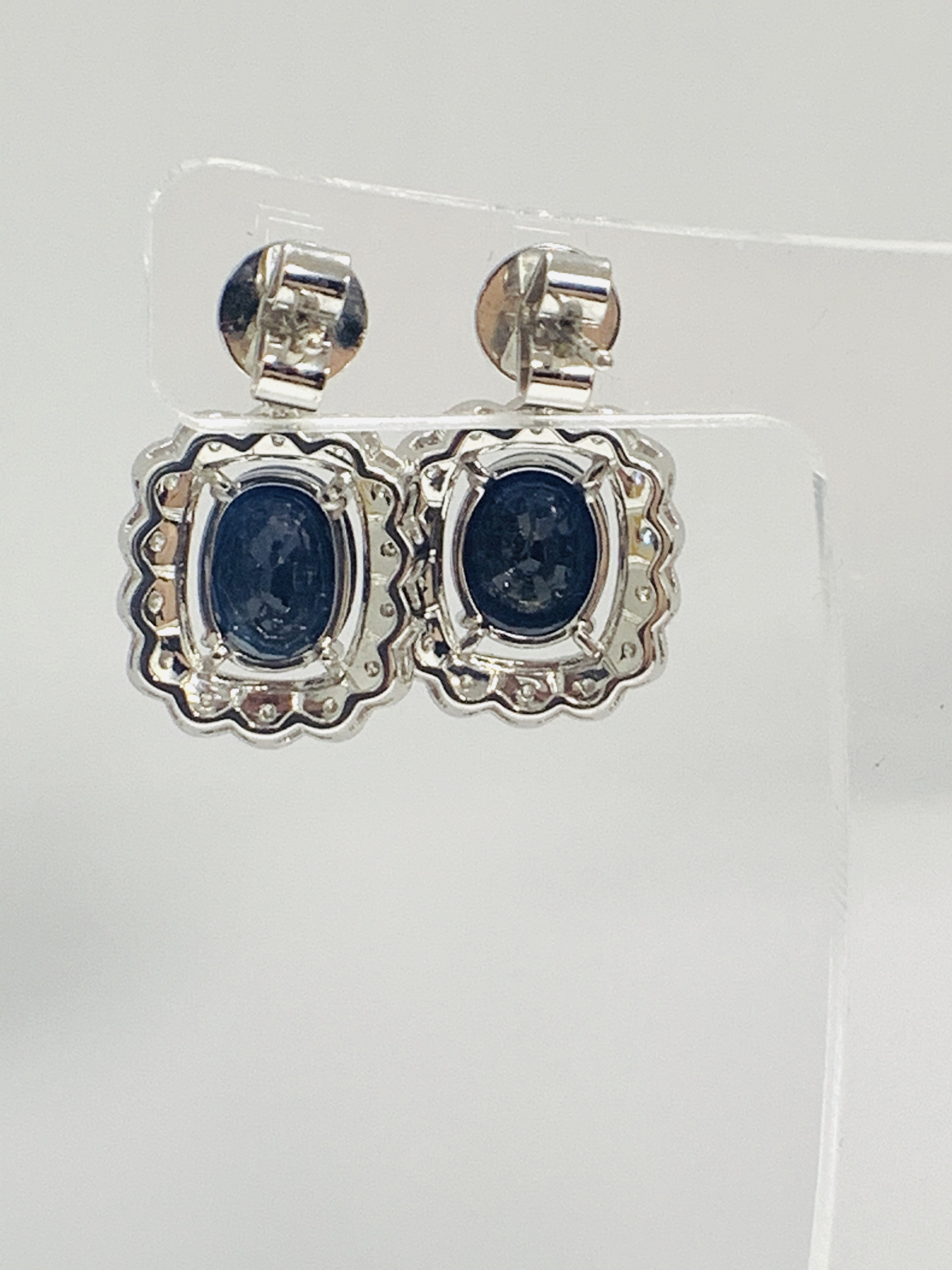 18ct White Gold Sapphire and Diamond earrings featiring, 2 oval cut, dark blue Kashmir Sapphires (4. - Image 10 of 12