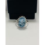 14ct White Gold Aquamarine and Diamond ring featuring centre, oval cut Aquamarine (3.16c), claw set,