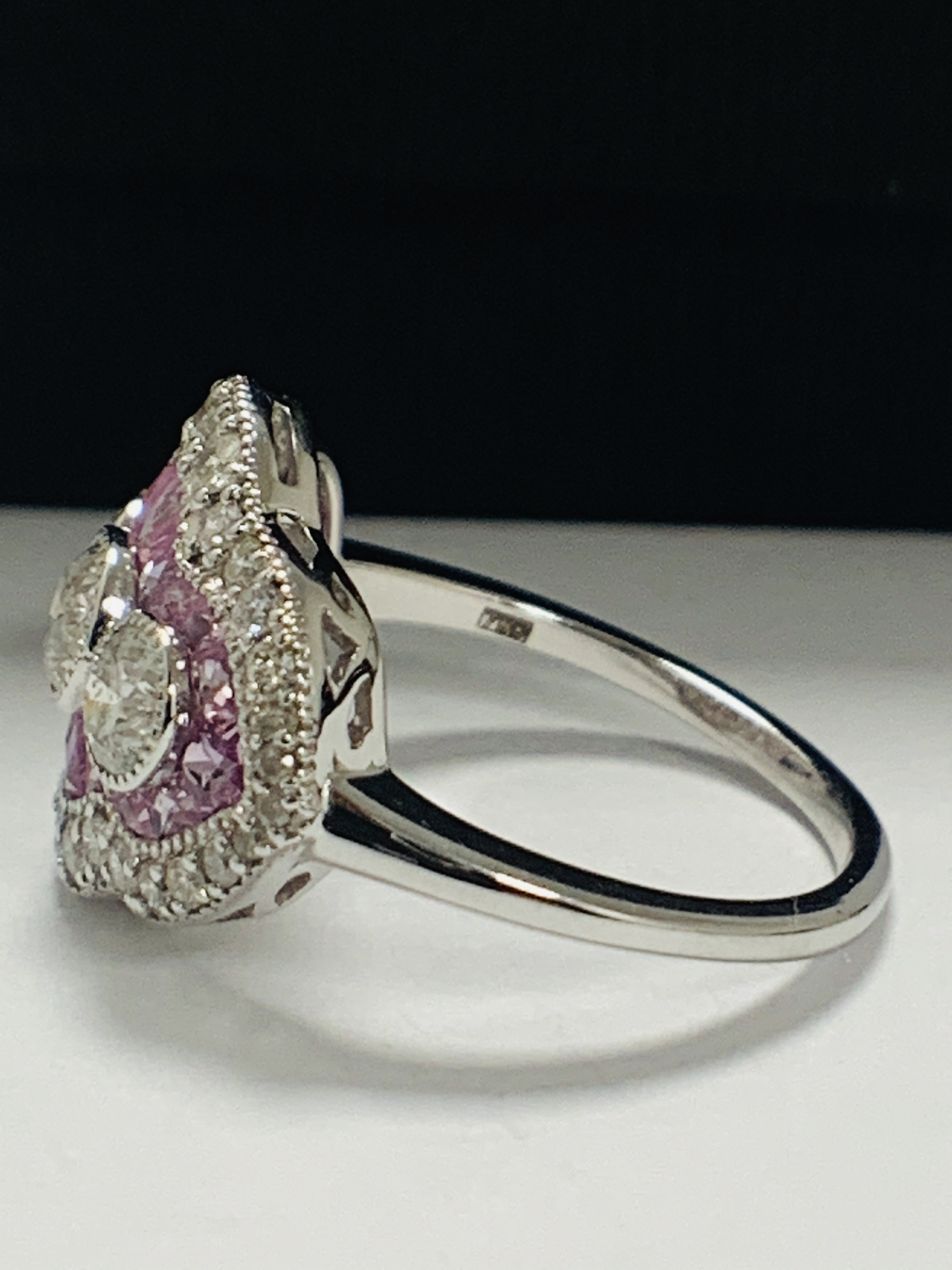 18ct White Gold Sapphire and Diamond ring featuring centre, 3 round brilliant cut Diamonds (0.50ct), - Image 4 of 11