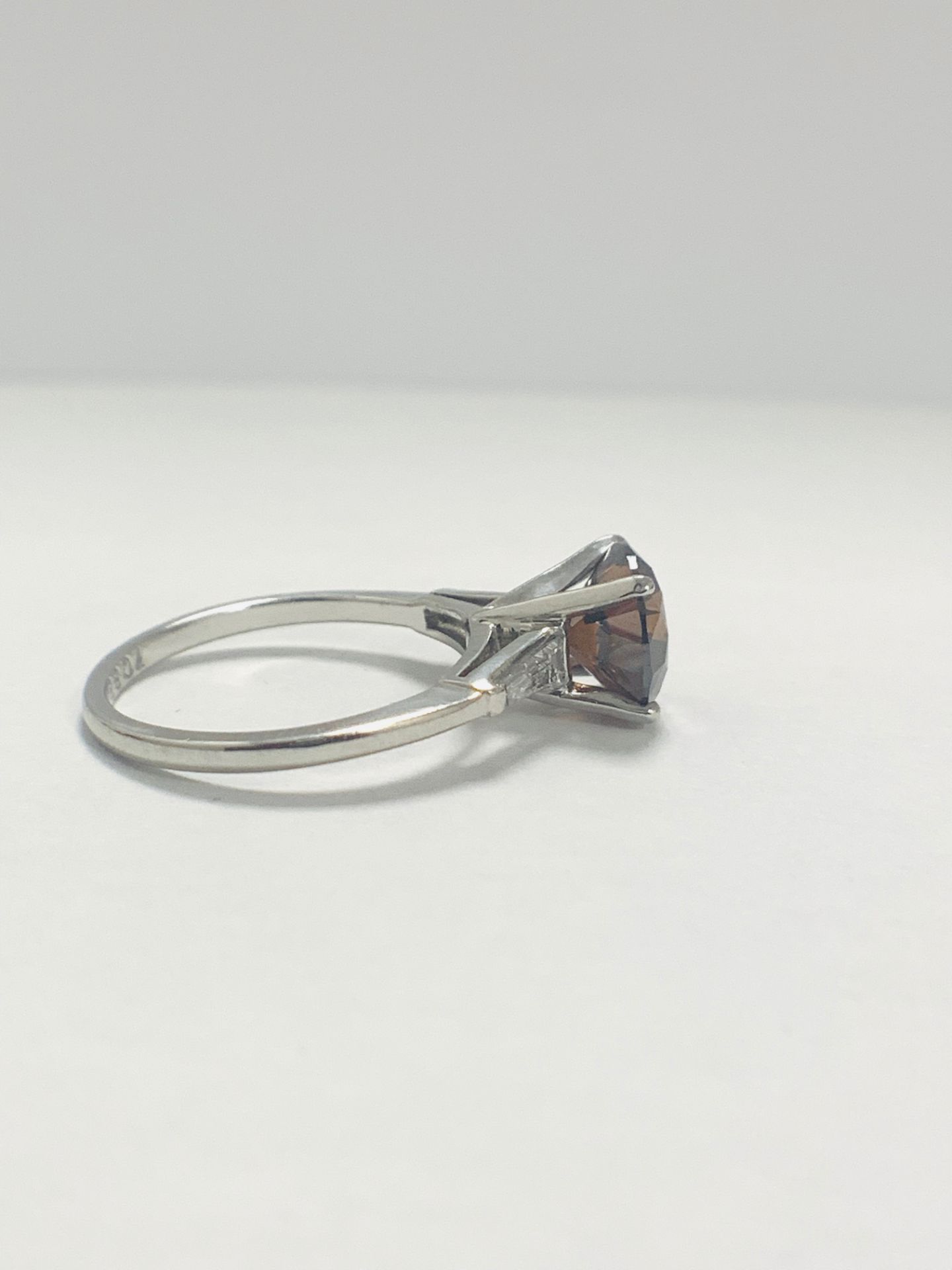 Platinum Diamond ring featuring centre, round brilliant cut, deep orangey brown Diamond (2.15ct) - Image 8 of 14