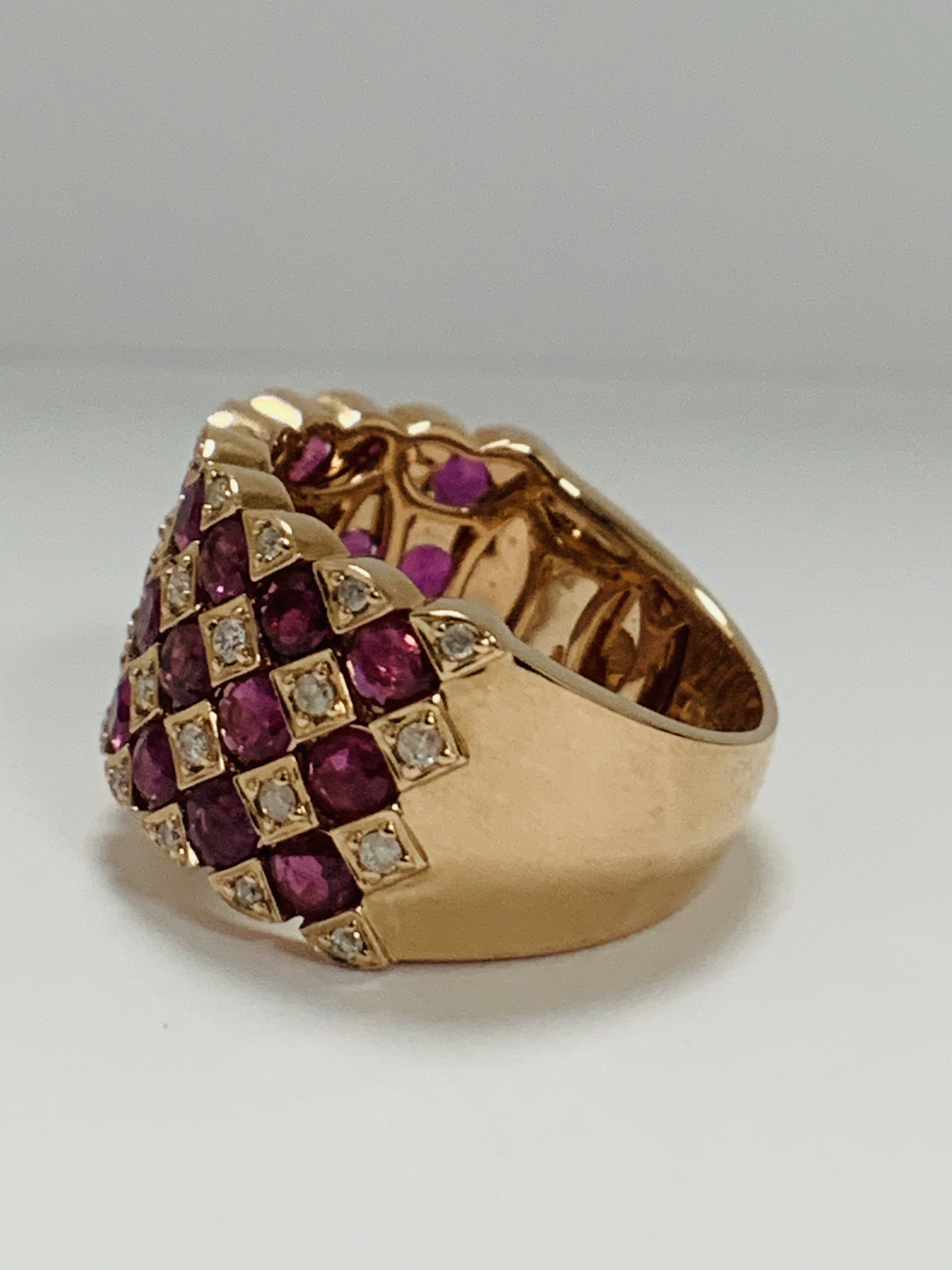 14ct Rose Gold Ruby and Diamond ring featuring, 27 round cut, medium pinkish red (2.81ct TSW), chann - Image 3 of 13