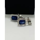 14ct White Gold Sapphire and Diamond drop earrings featuring, emerald cut, vivid blue Sapphires (2.1