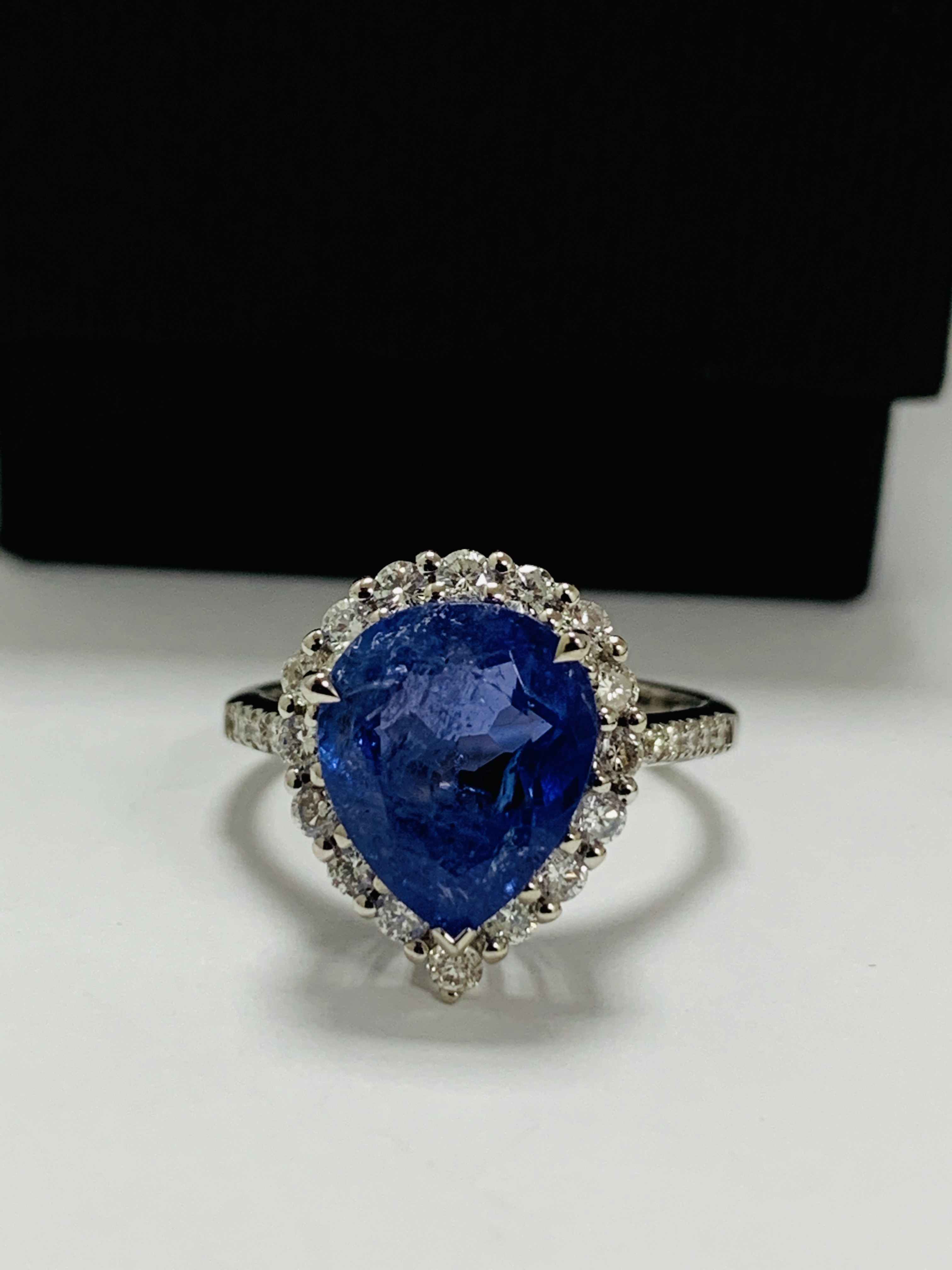 14ct White Gold Tanzanite and Diamond ring featuring, pear cut Tanzanite (4.17ct), claw set, with 28 - Image 9 of 13