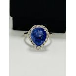 14ct White Gold Tanzanite and Diamond ring featuring, pear cut Tanzanite (4.17ct), claw set, with 28