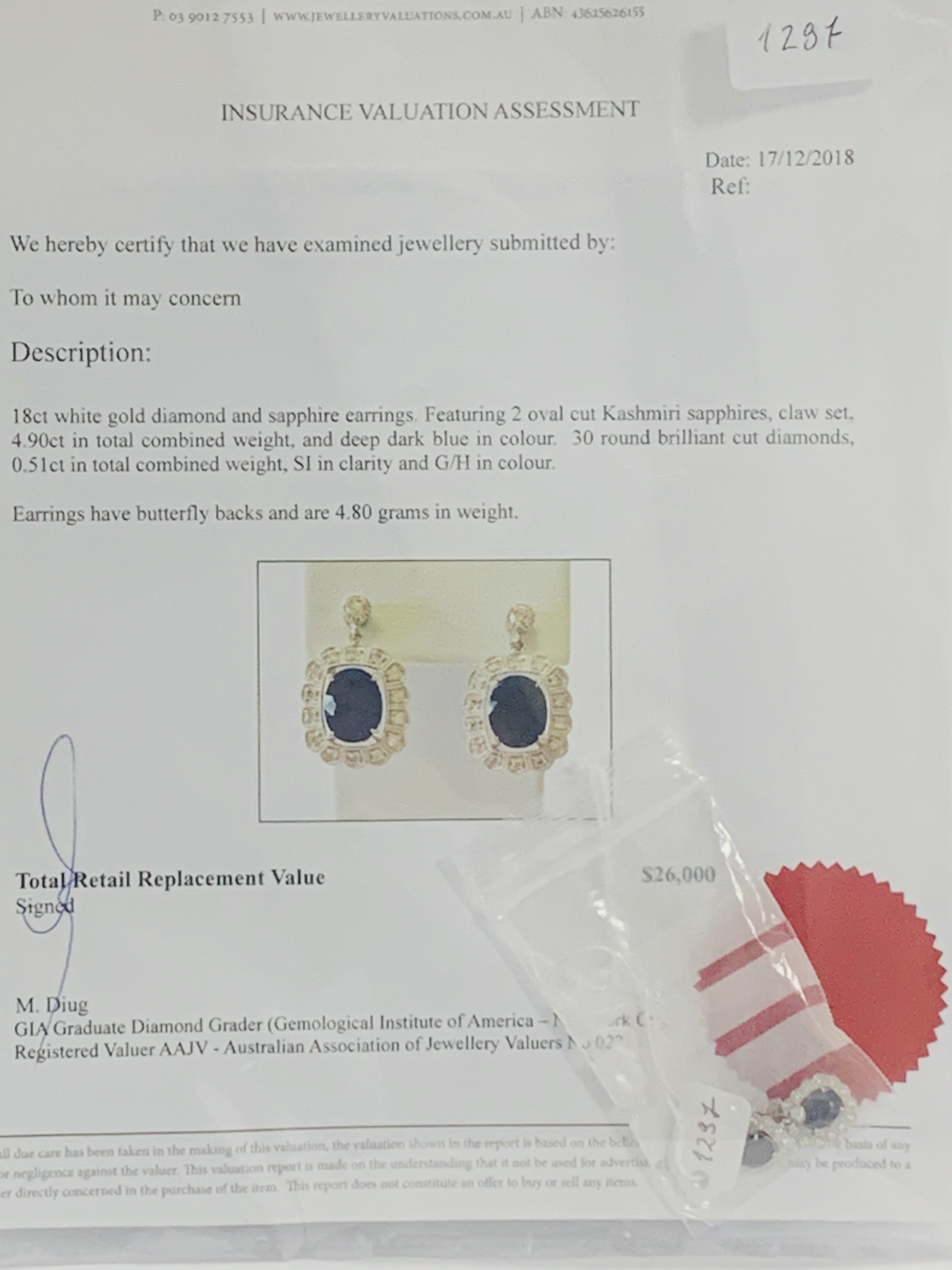 18ct White Gold Sapphire and Diamond earrings featiring, 2 oval cut, dark blue Kashmir Sapphires (4. - Image 12 of 12