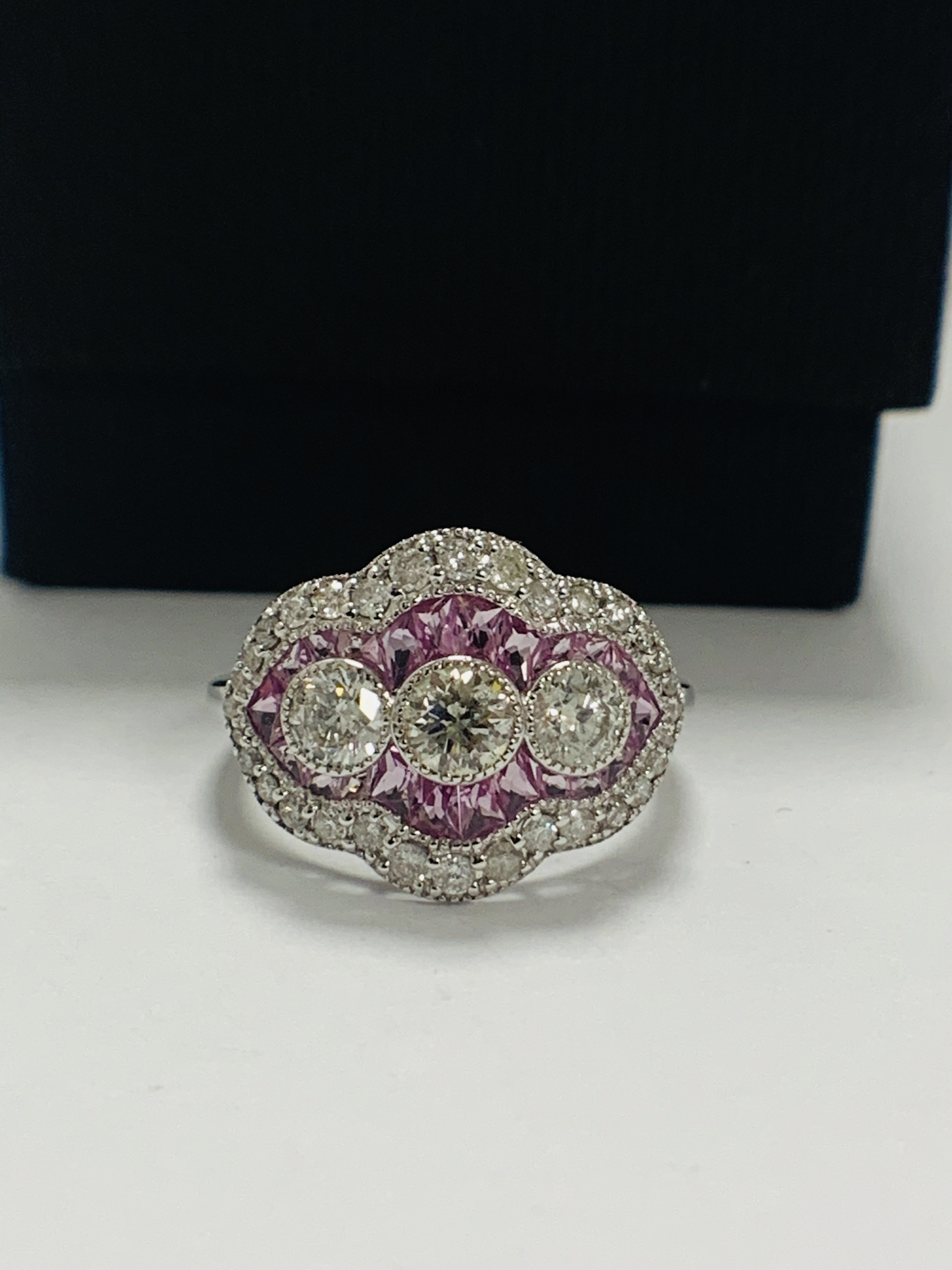 18ct White Gold Sapphire and Diamond ring featuring centre, 3 round brilliant cut Diamonds (0.50ct), - Image 9 of 11
