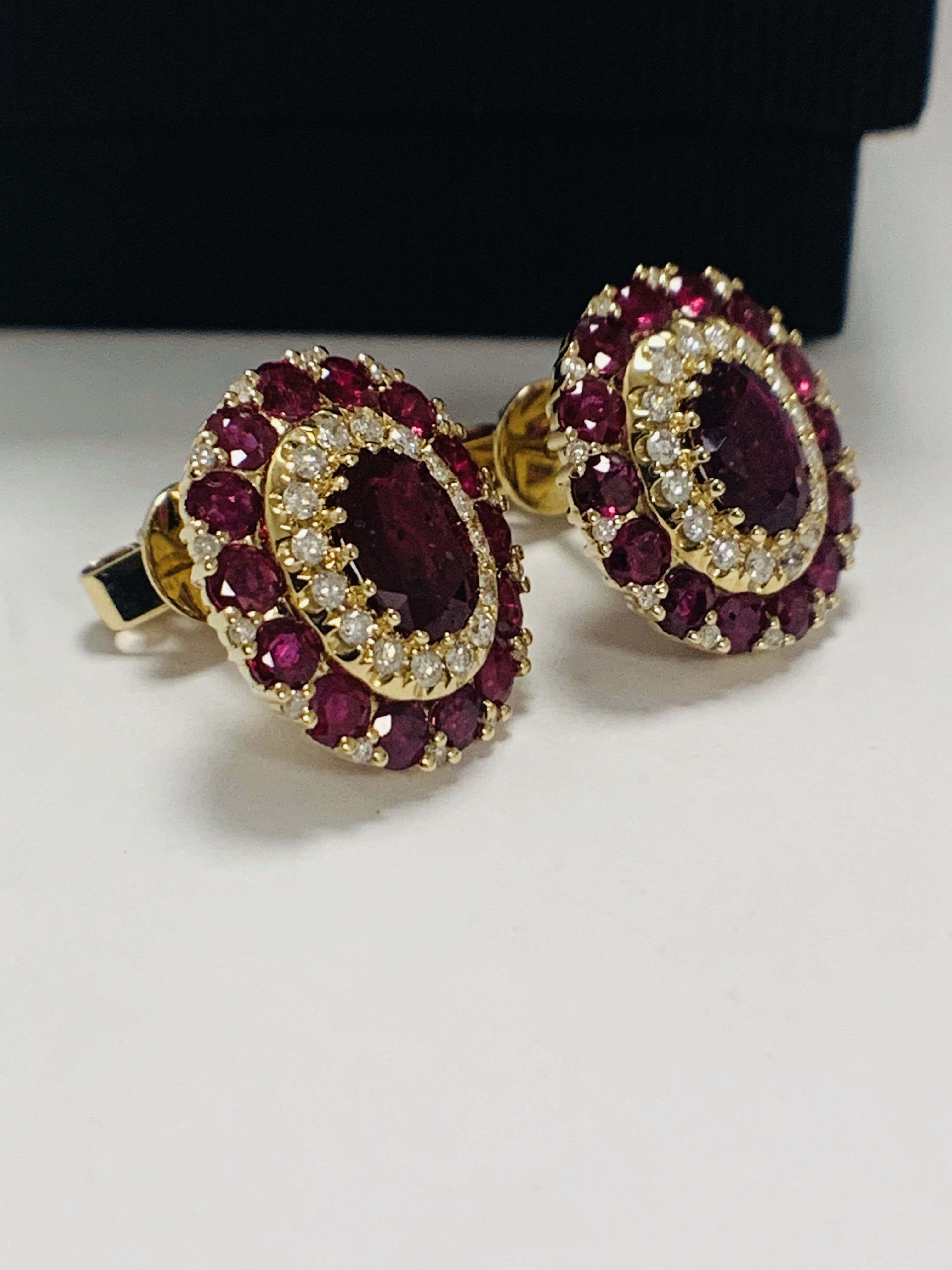 14ct Rose Gold Ruby and Diamond stud earrings featuring, 2 oval cut Rubies (1.47ct TSW), claw set, w - Image 6 of 12