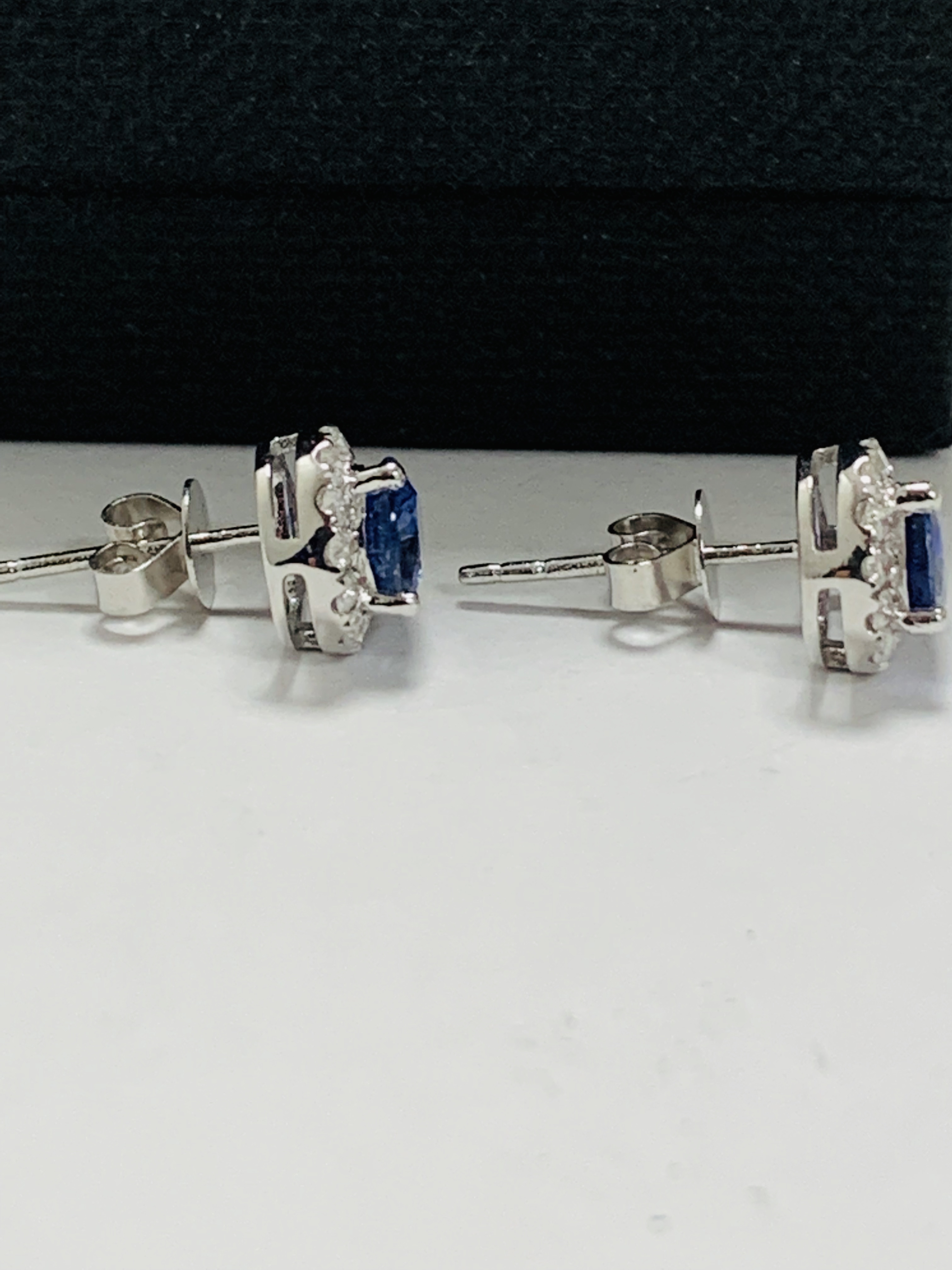 14ct White Gold Sapphire and Diamond earrings featuring centre, 2 pear cut, medium blue Sapphire (1. - Image 8 of 12