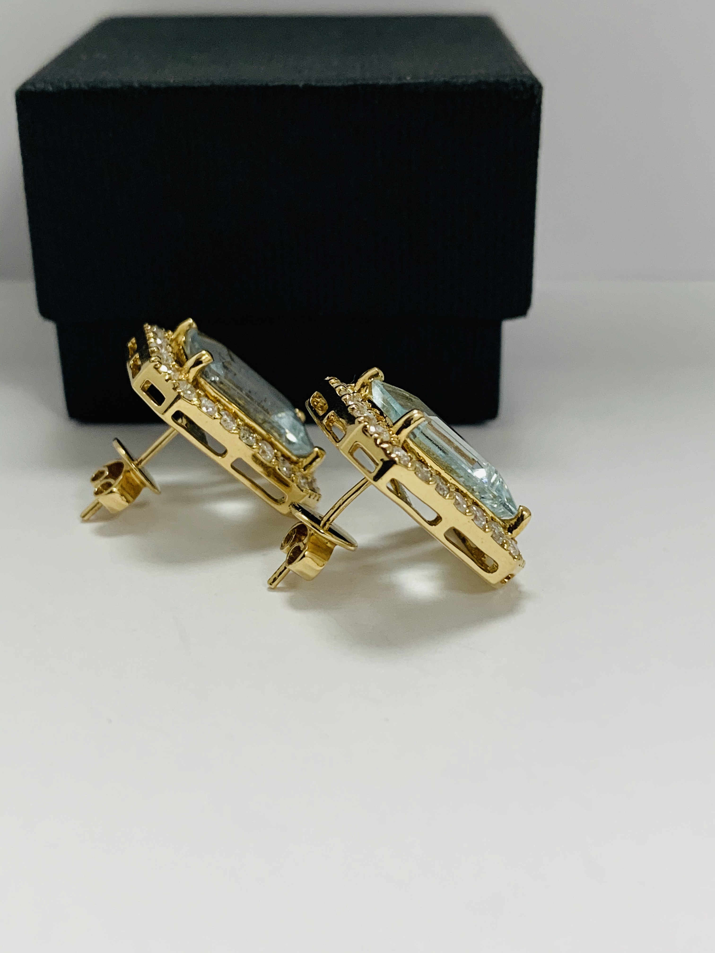 14ct Yellow Gold Aqumarine and Diamond stud earrings featuring, 2 emerald cut Aquamarines (13.00ct T - Image 6 of 12