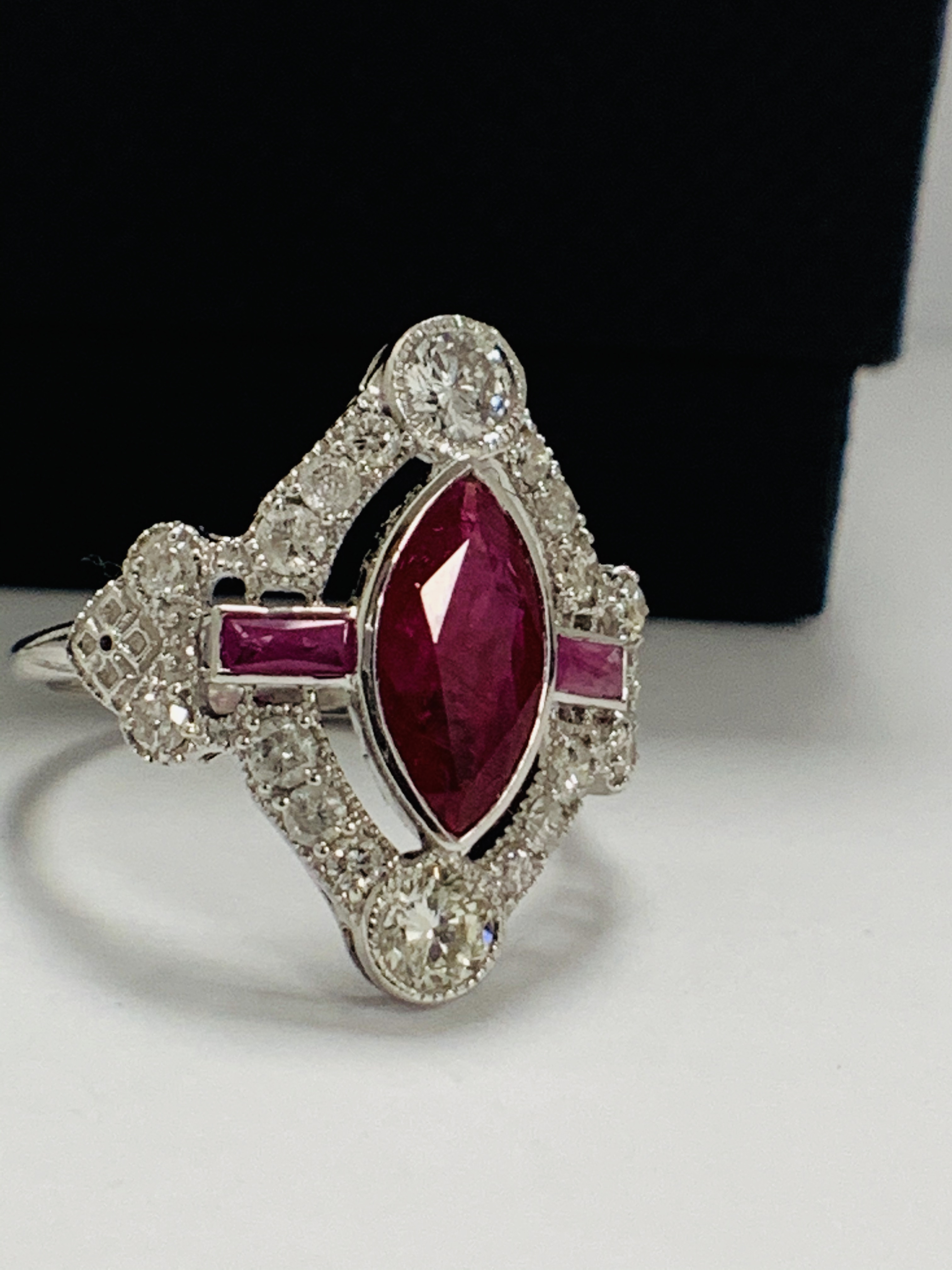 18ct White Gold Ruby and Diamond ring featuring centre, marquise cut, Natural Ruby (1.34ct), claaw s - Image 9 of 13