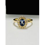 14ct yellow gold sapphire and diamond ring.