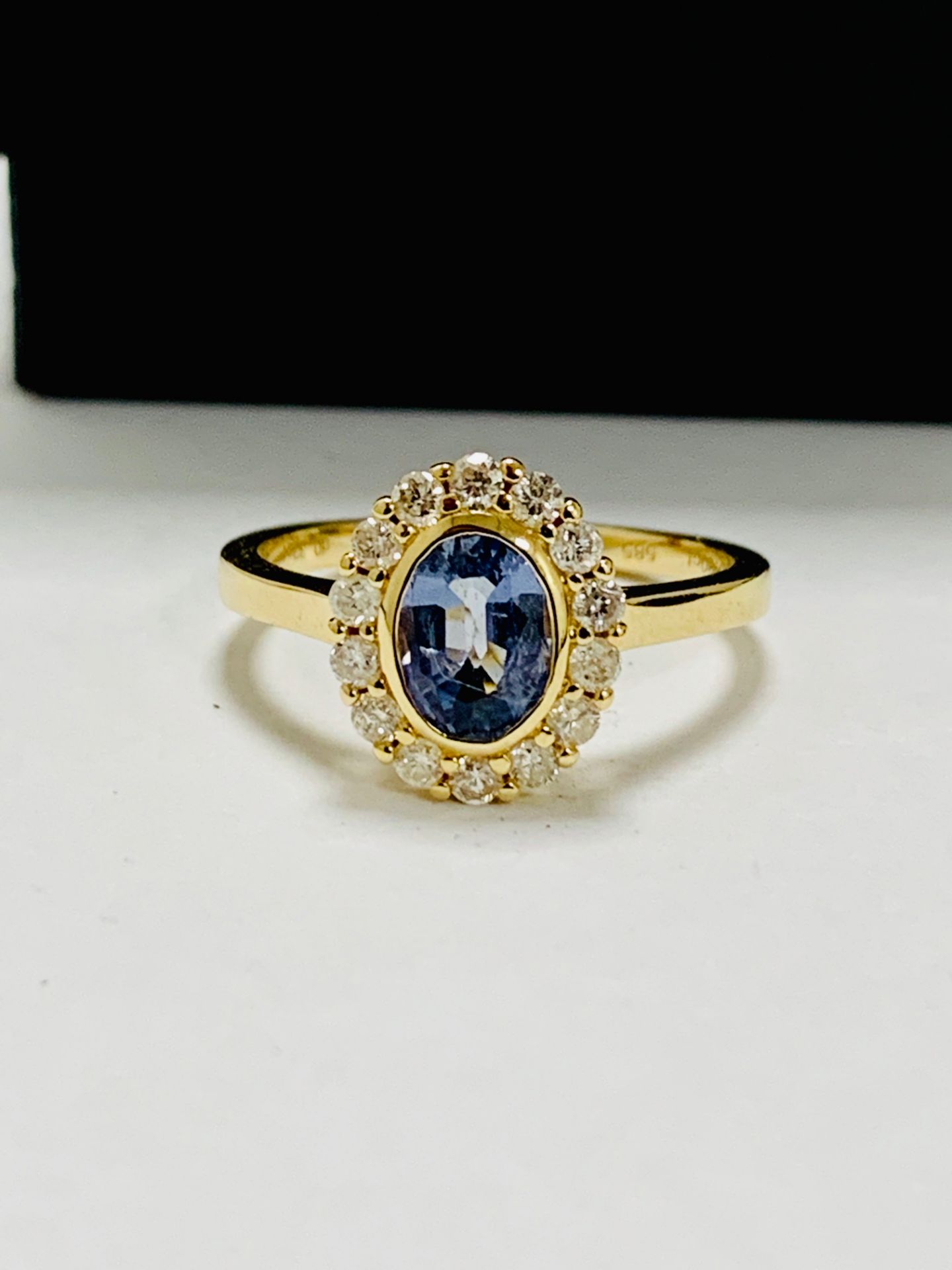 14ct yellow gold sapphire and diamond ring.