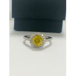 14ct White Gold Diamond ring featuring centre, round brilliant cut, yellow Diamond (1.08ct)