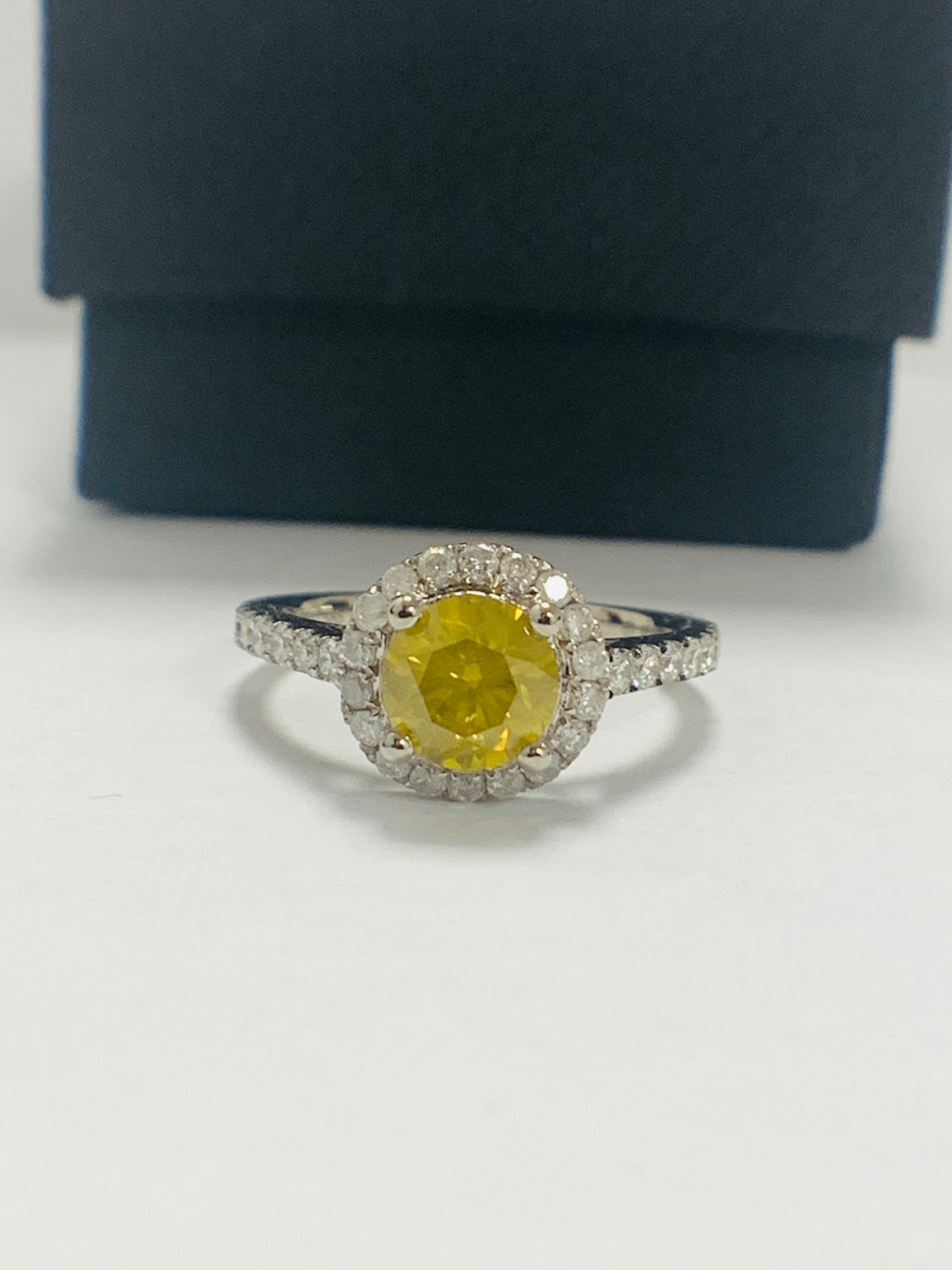 14ct White Gold Diamond ring featuring centre, round brilliant cut, yellow Diamond (1.08ct)