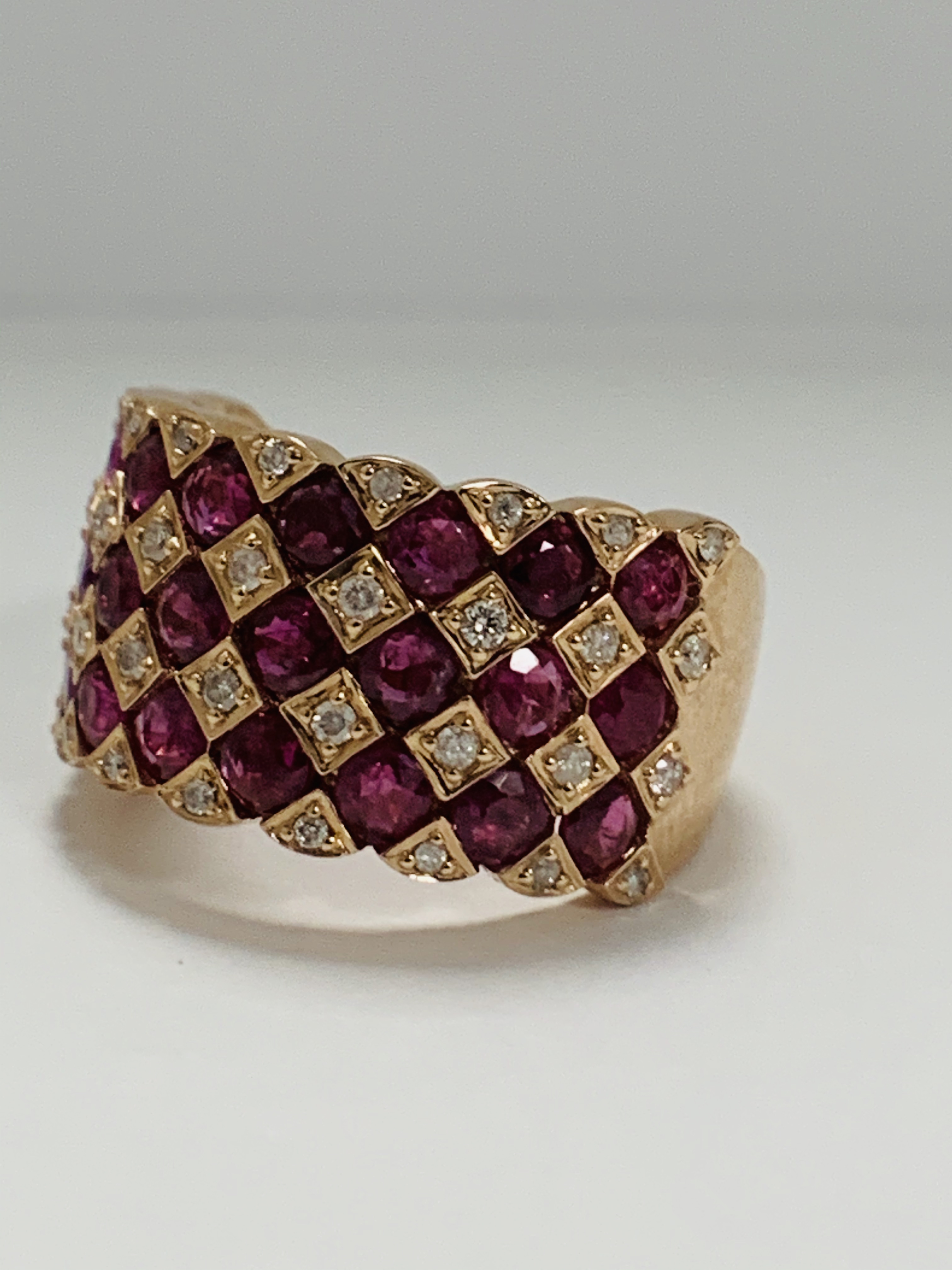 14ct Rose Gold Ruby and Diamond ring featuring, 27 round cut, medium pinkish red (2.81ct TSW), chann - Image 2 of 13