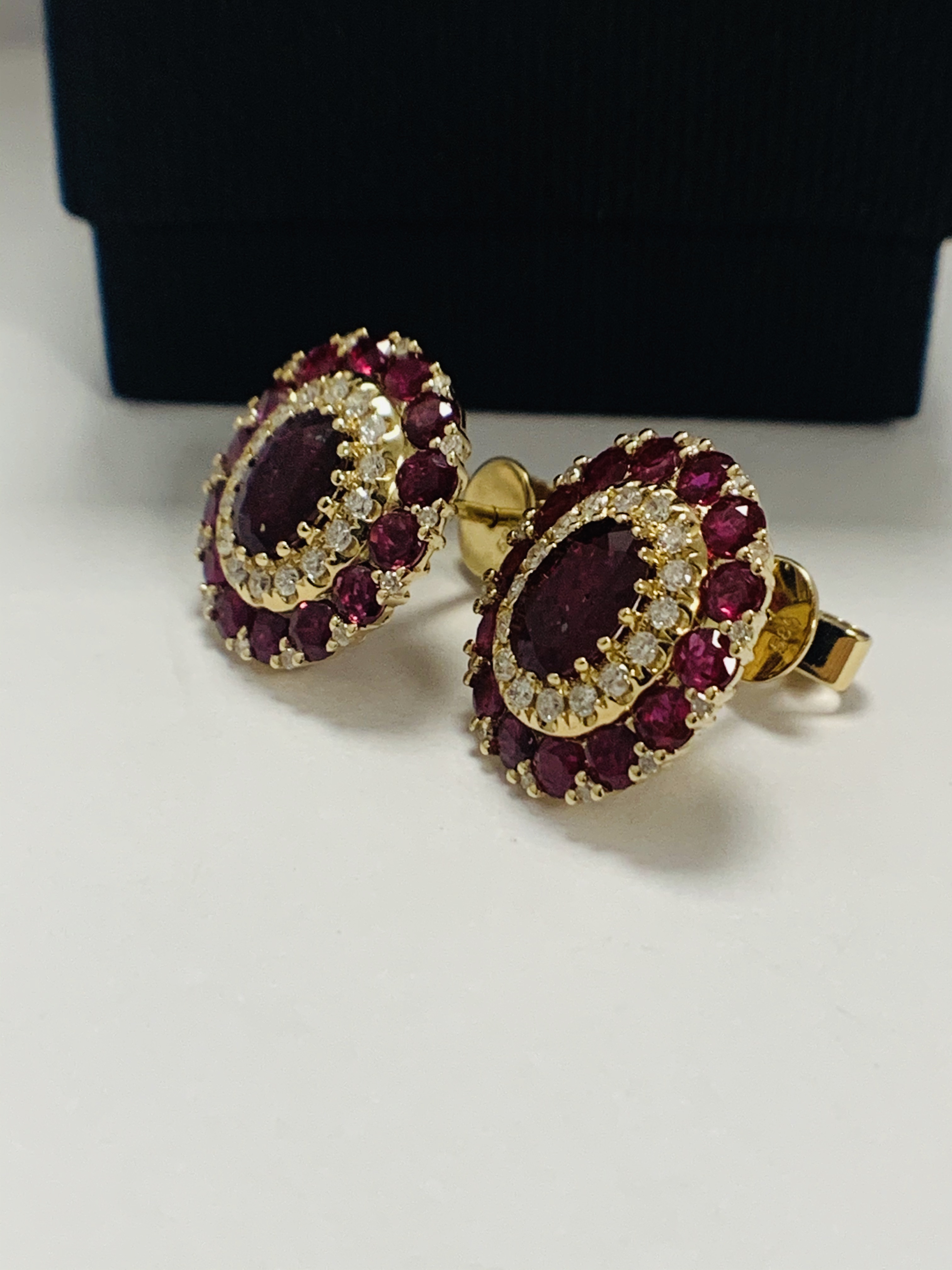 14ct Rose Gold Ruby and Diamond stud earrings featuring, 2 oval cut Rubies (1.47ct TSW), claw set, w - Image 2 of 12