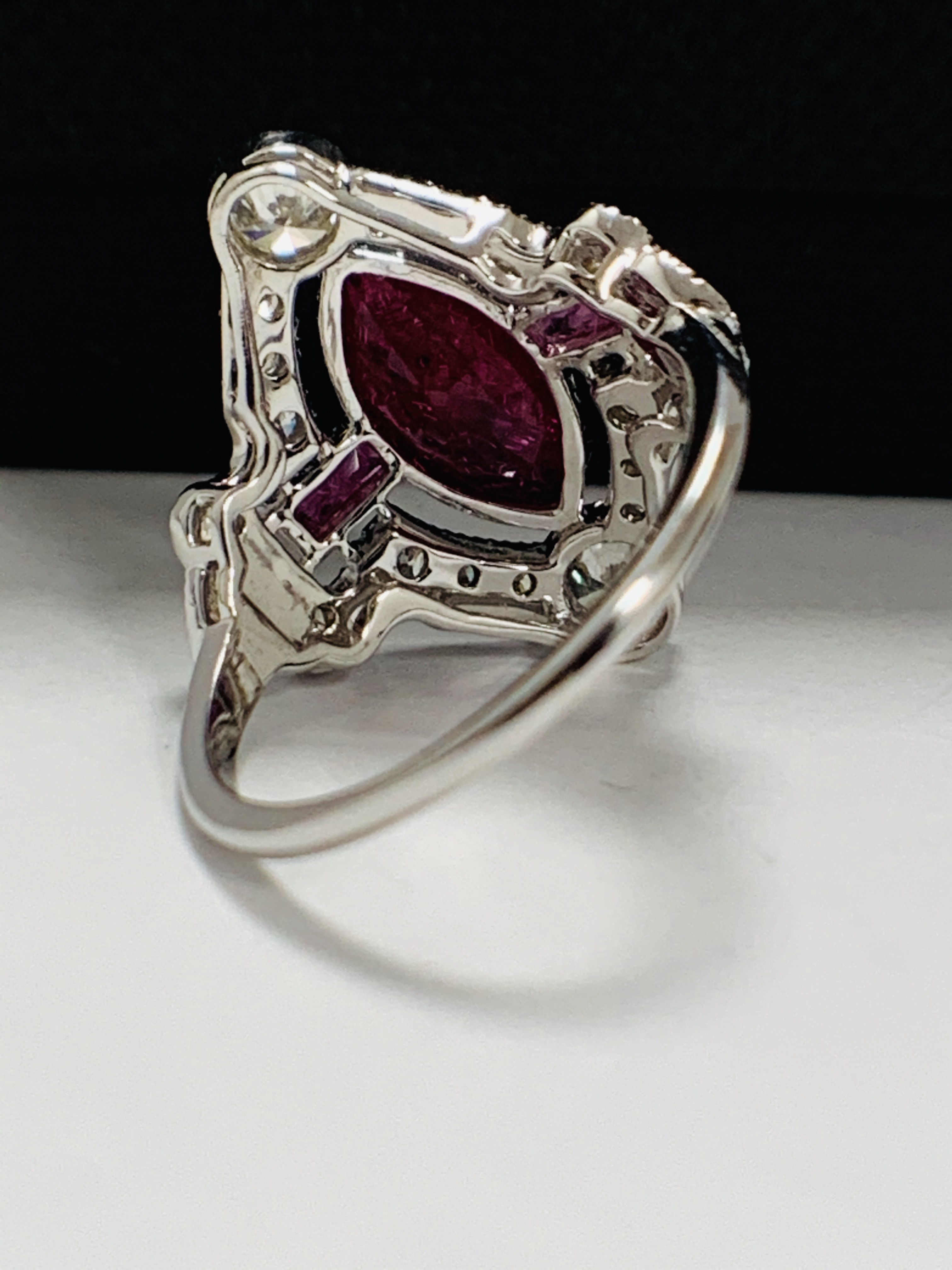 18ct White Gold Ruby and Diamond ring featuring centre, marquise cut, Natural Ruby (1.34ct), claaw s - Image 6 of 13