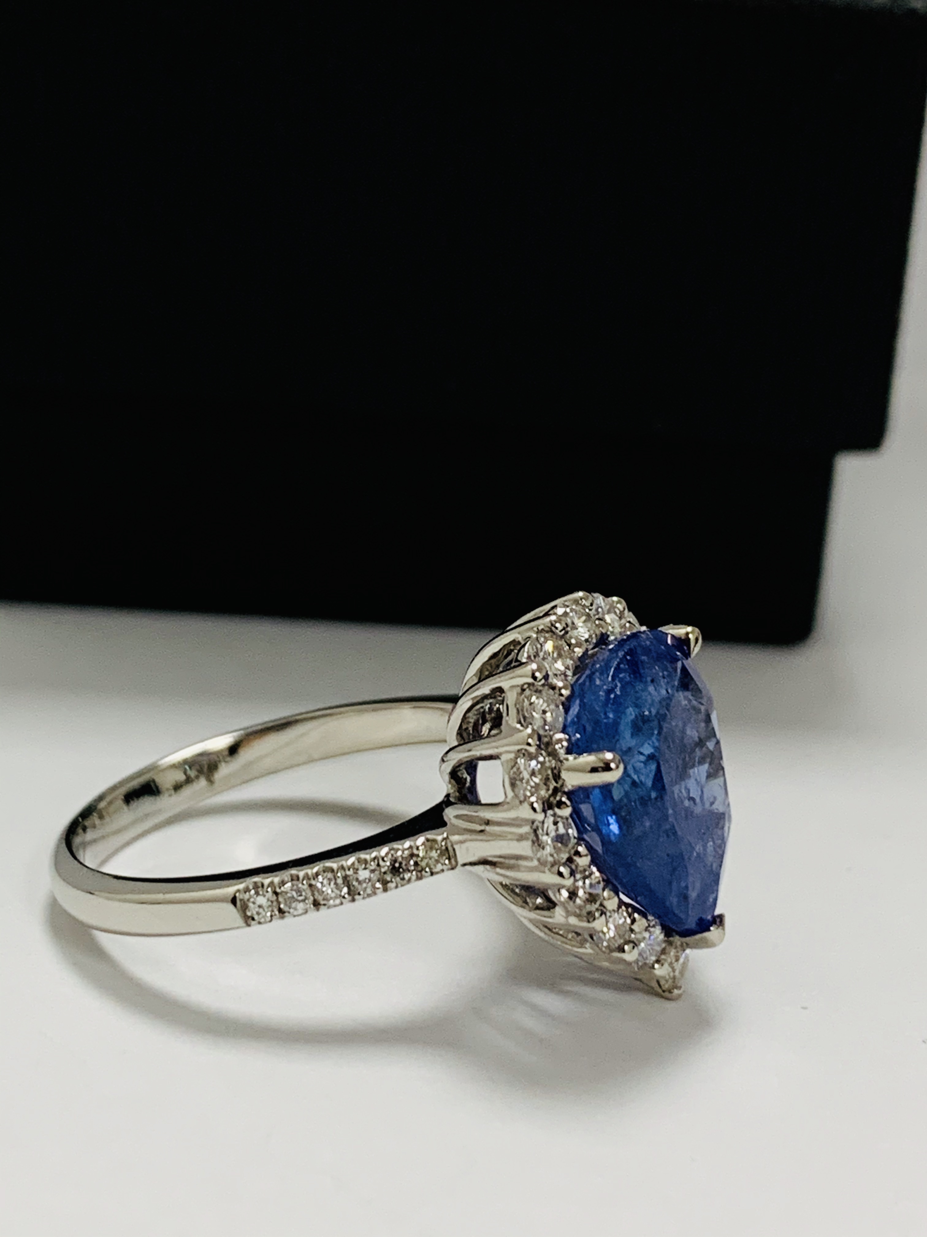 14ct White Gold Tanzanite and Diamond ring featuring, pear cut Tanzanite (4.17ct), claw set, with 28 - Image 7 of 13