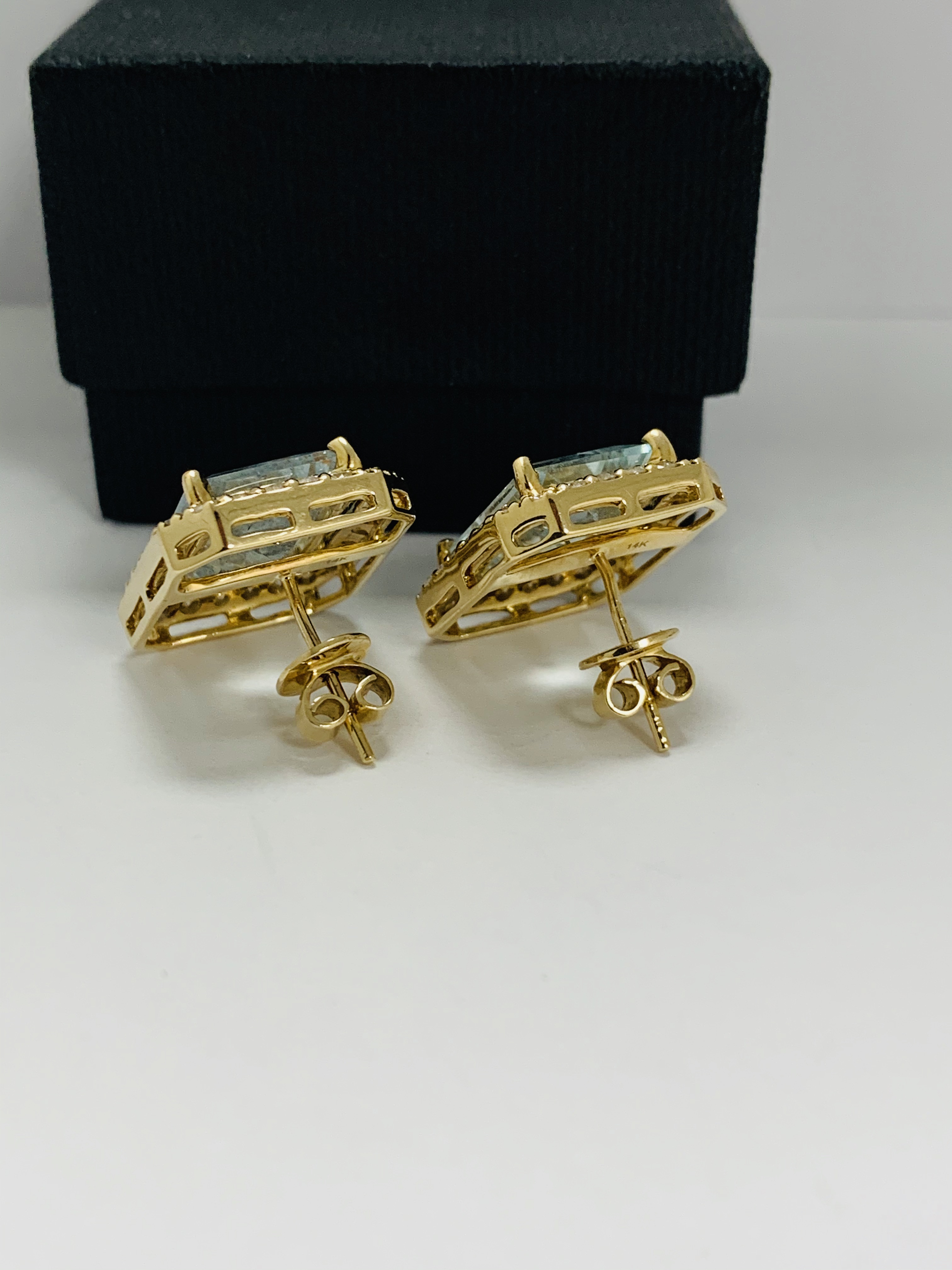 14ct Yellow Gold Aqumarine and Diamond stud earrings featuring, 2 emerald cut Aquamarines (13.00ct T - Image 4 of 12