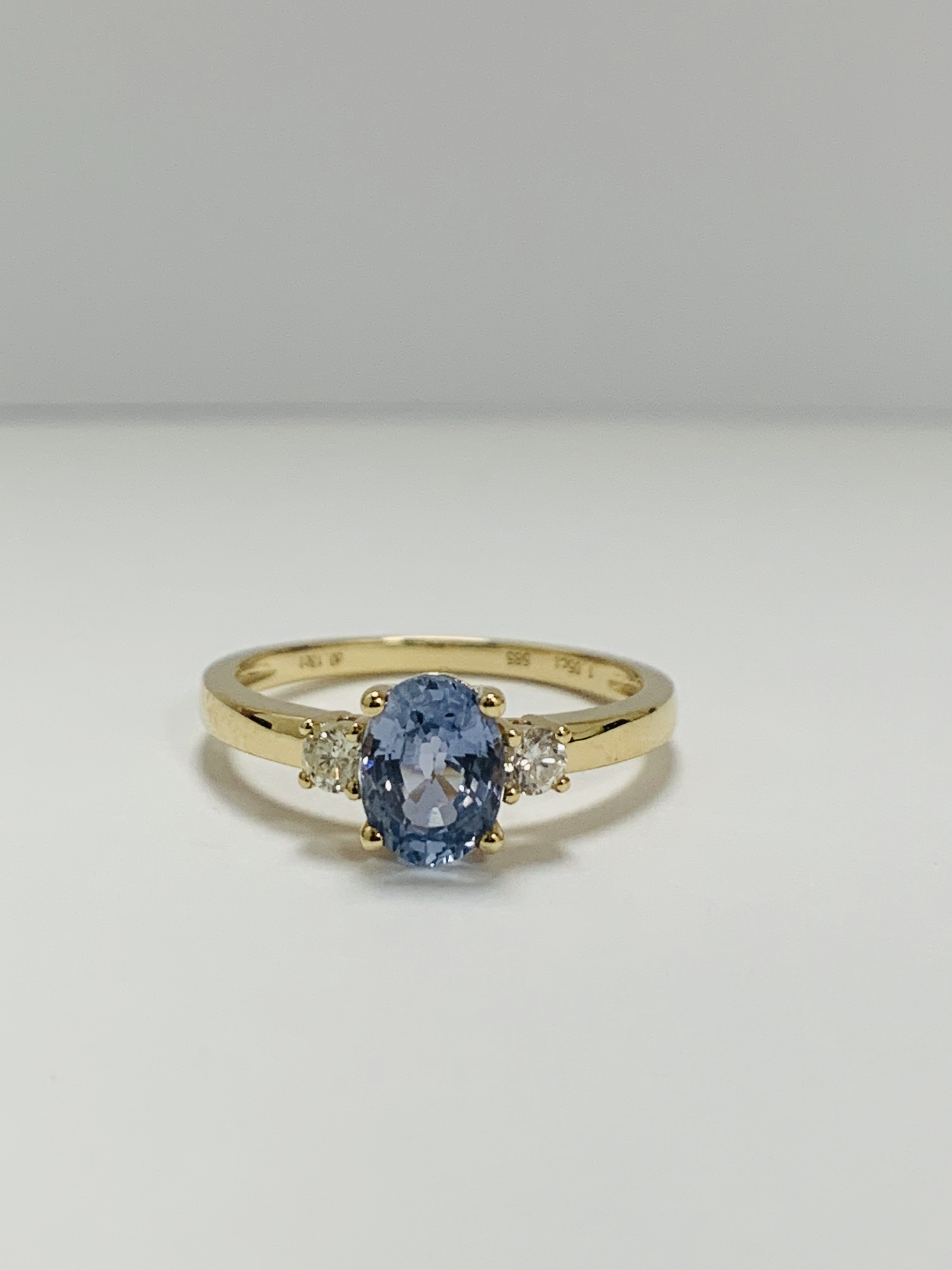 14ct Yellow Gold Sapphire and Diamond ring featuring centre, oval cut, medium blue Sapphire (1.05ct) - Image 6 of 9