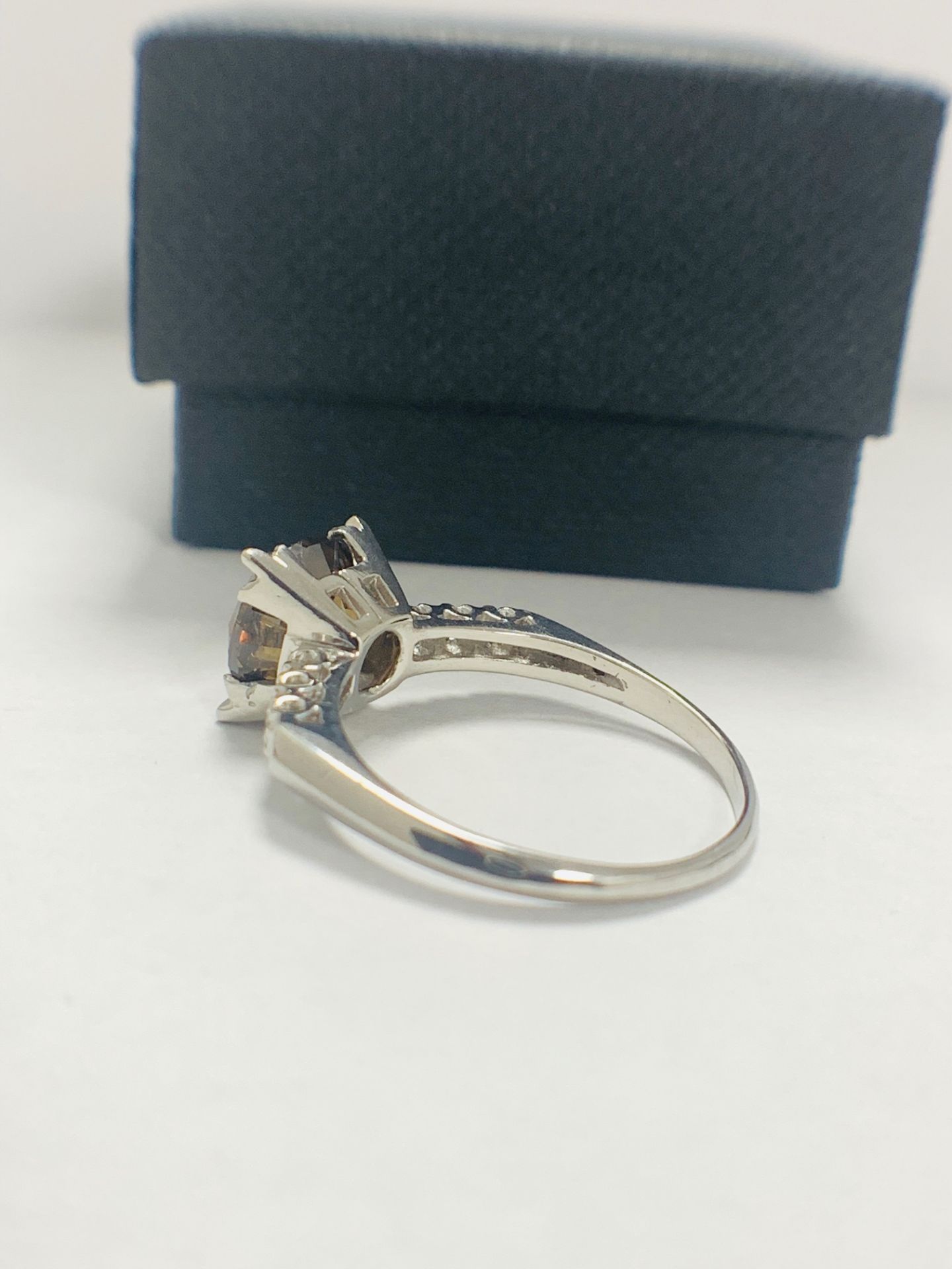Platinum Diamond ring featuring centre, round brilliant cut, medium yellowish brown Diamond (3.20ct) - Image 4 of 9