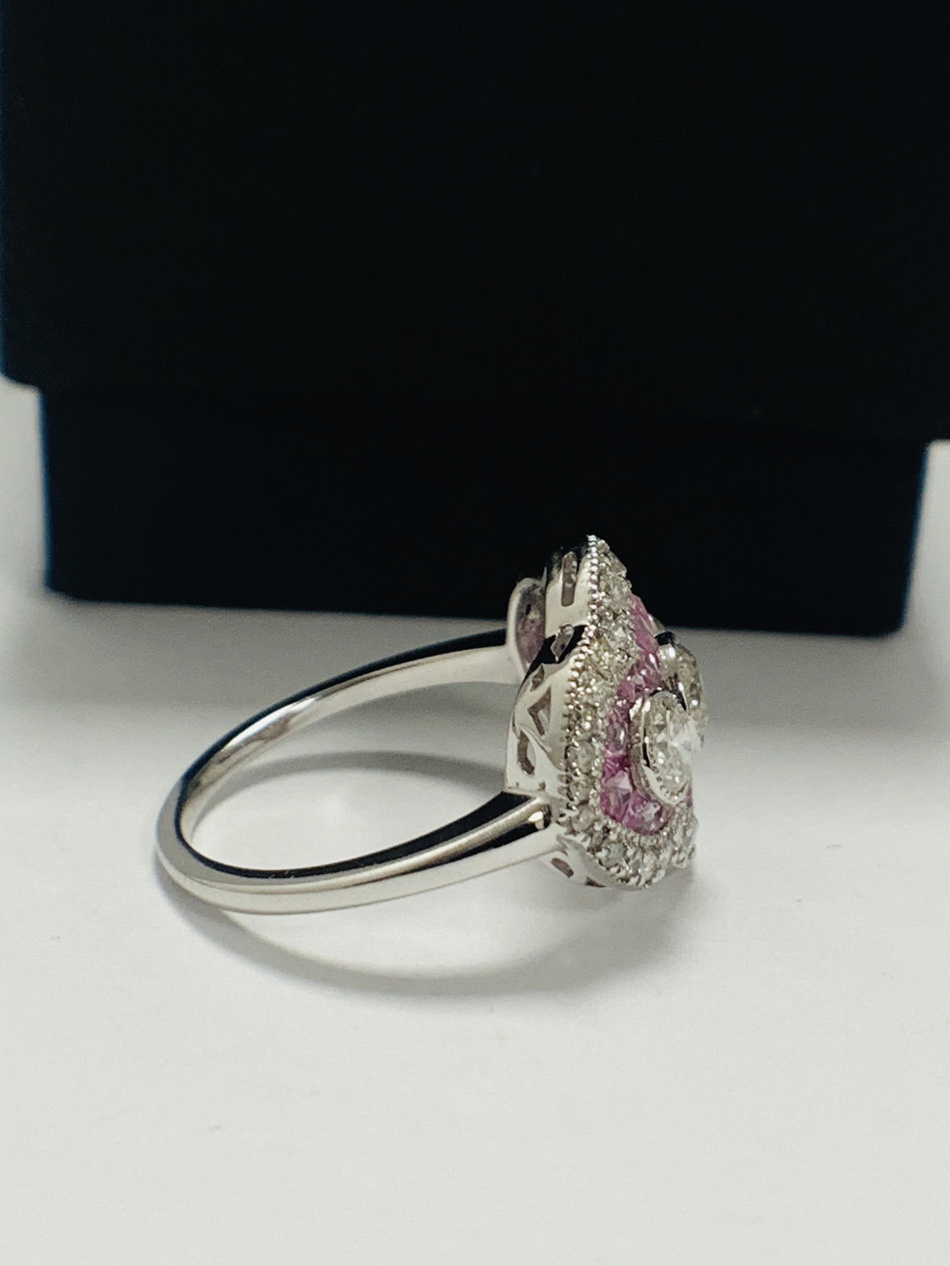 18ct White Gold Sapphire and Diamond ring featuring centre, 3 round brilliant cut Diamonds (0.50ct), - Image 7 of 11