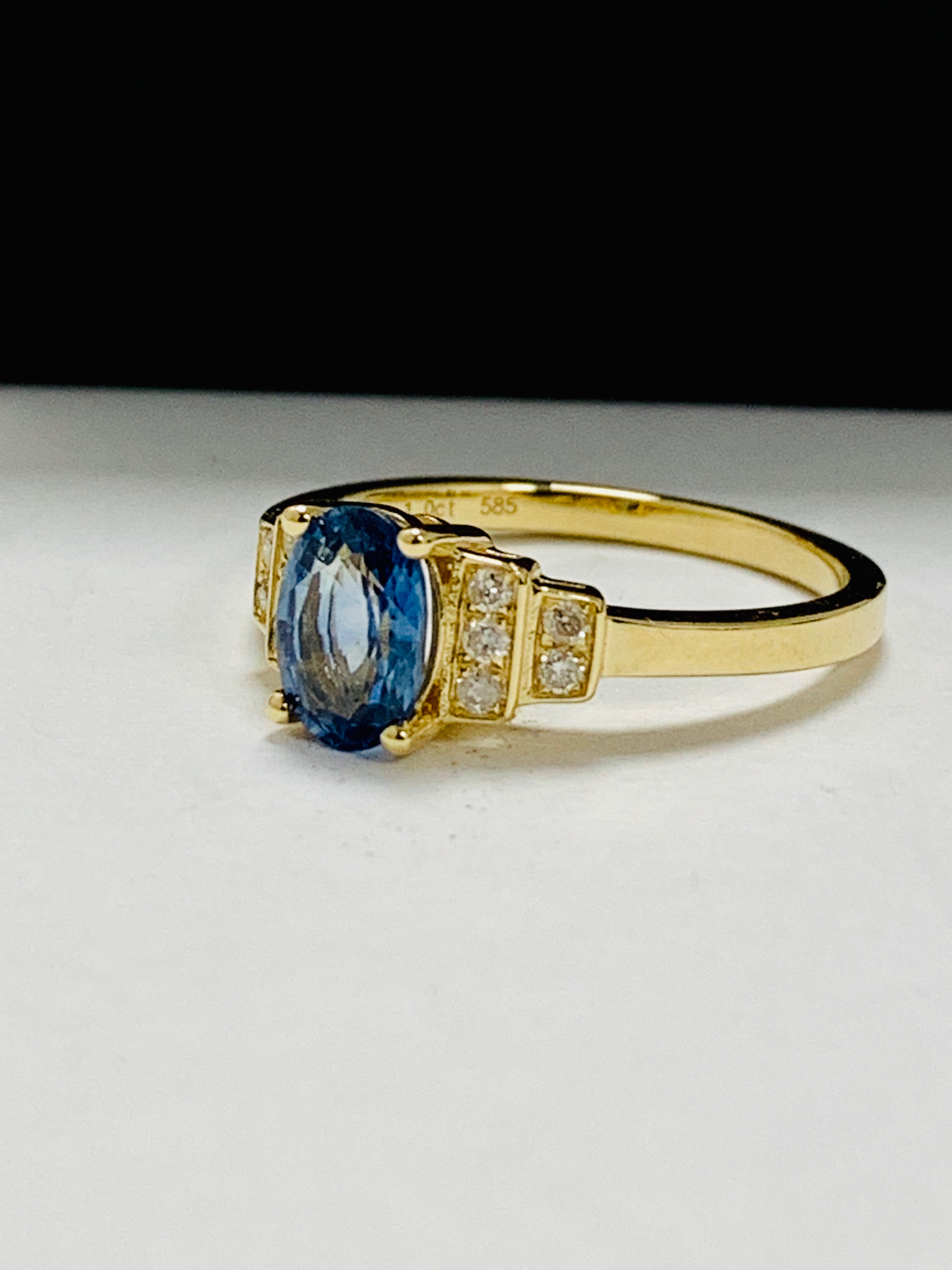 14ct yellow gold sapphire and diamond ring. - Image 2 of 9