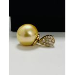 14ct Yellow Gold Pearl and Diamond pendant featuring, golden South Sea Pearl, with 13 round brillian