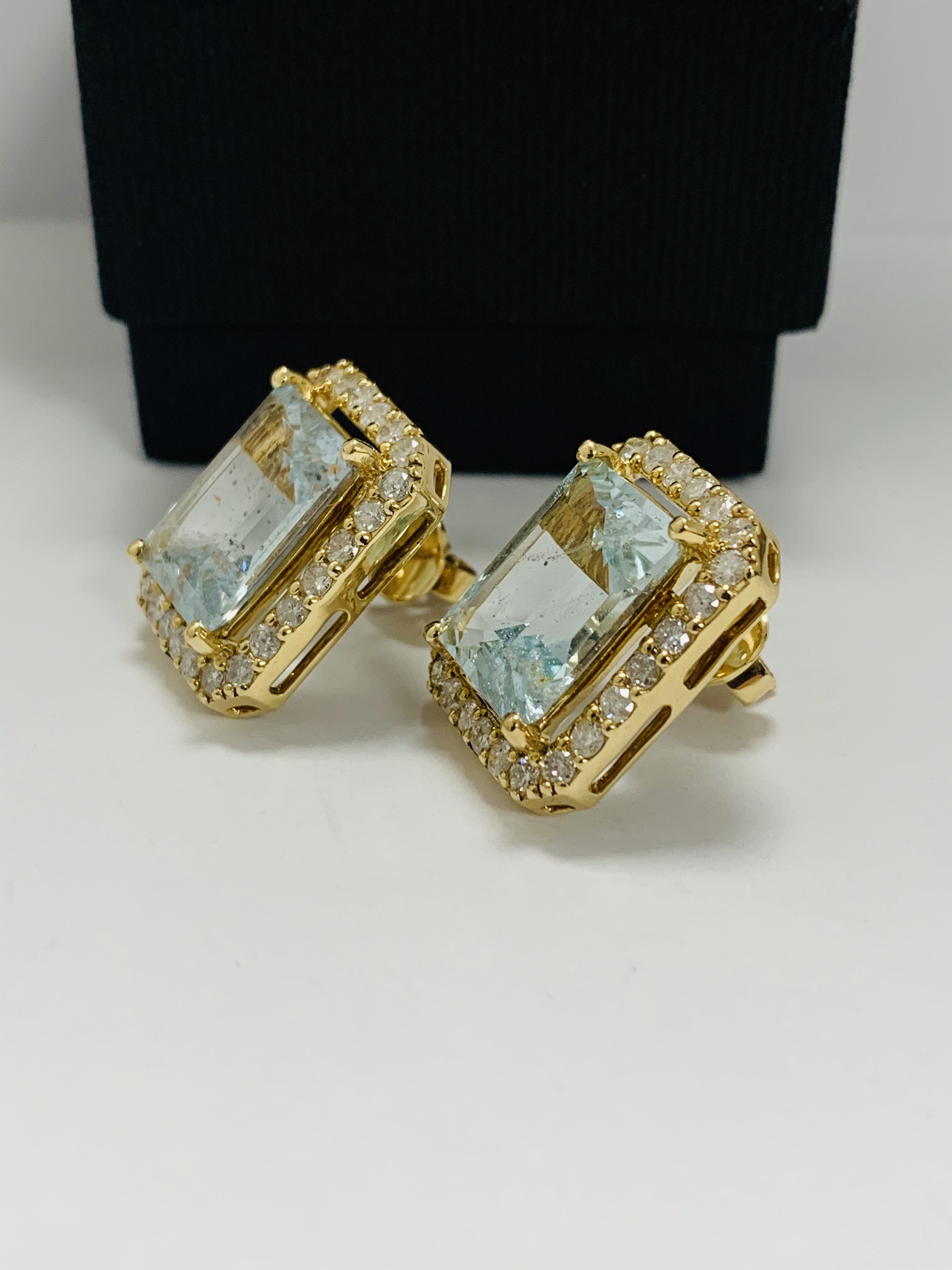 14ct Yellow Gold Aqumarine and Diamond stud earrings featuring, 2 emerald cut Aquamarines (13.00ct T - Image 2 of 12