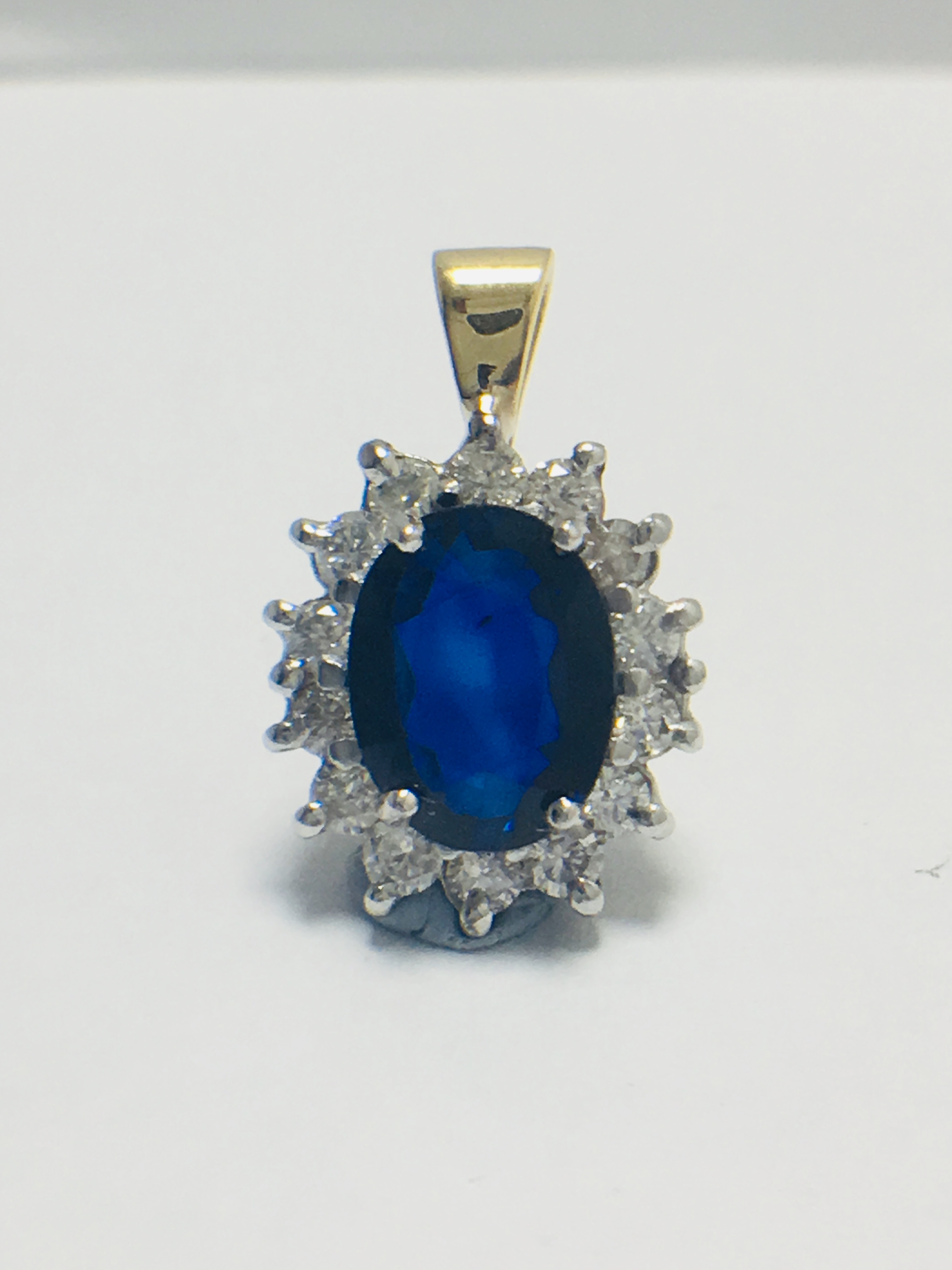 Sapphire and Diamond pendant,18ct gold