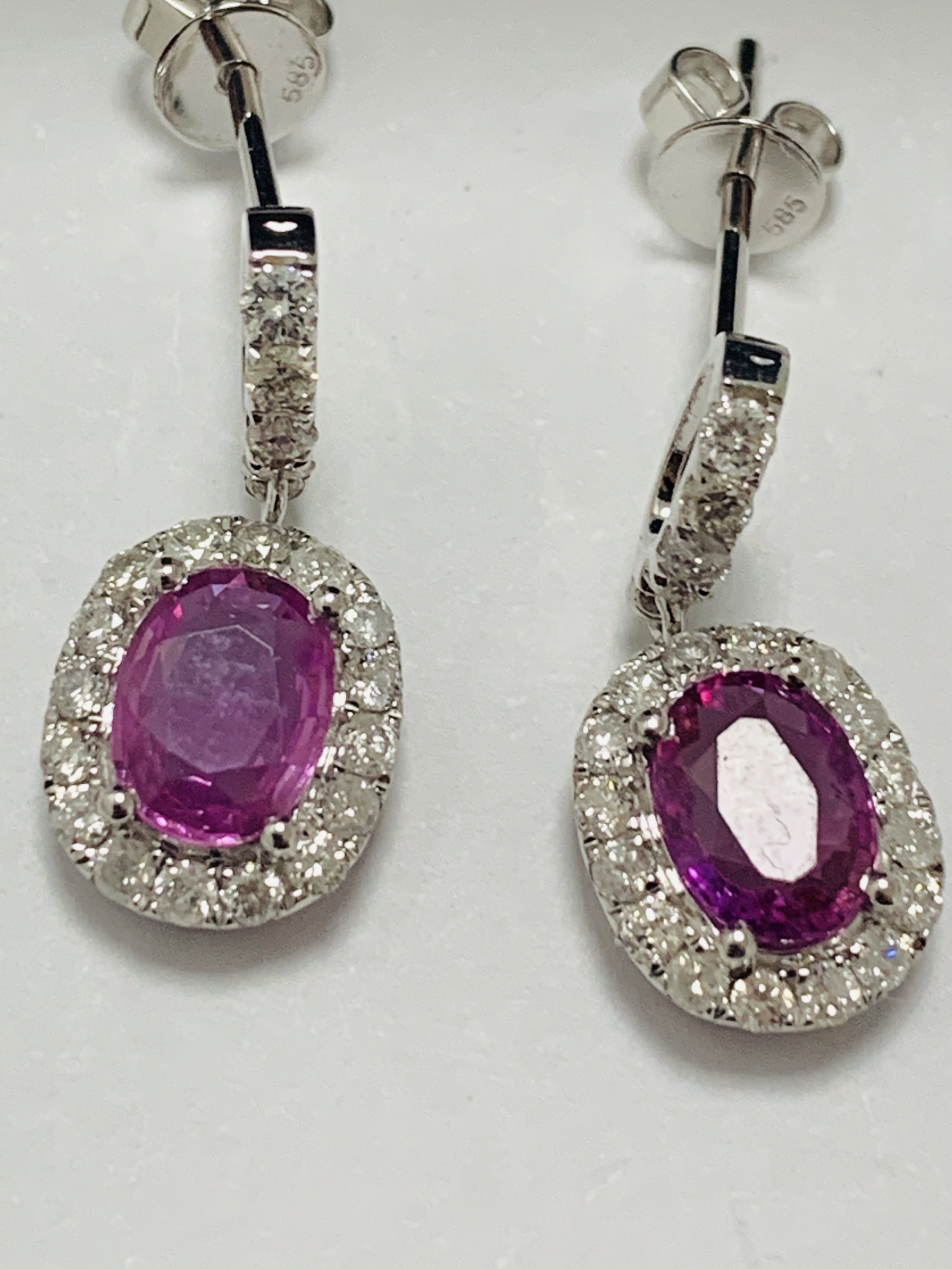 14ct White Gold Sapphire and Diamond drop earrings featuring, 2 oval cut, pink Sapphires (1.66ct TSW - Image 6 of 9